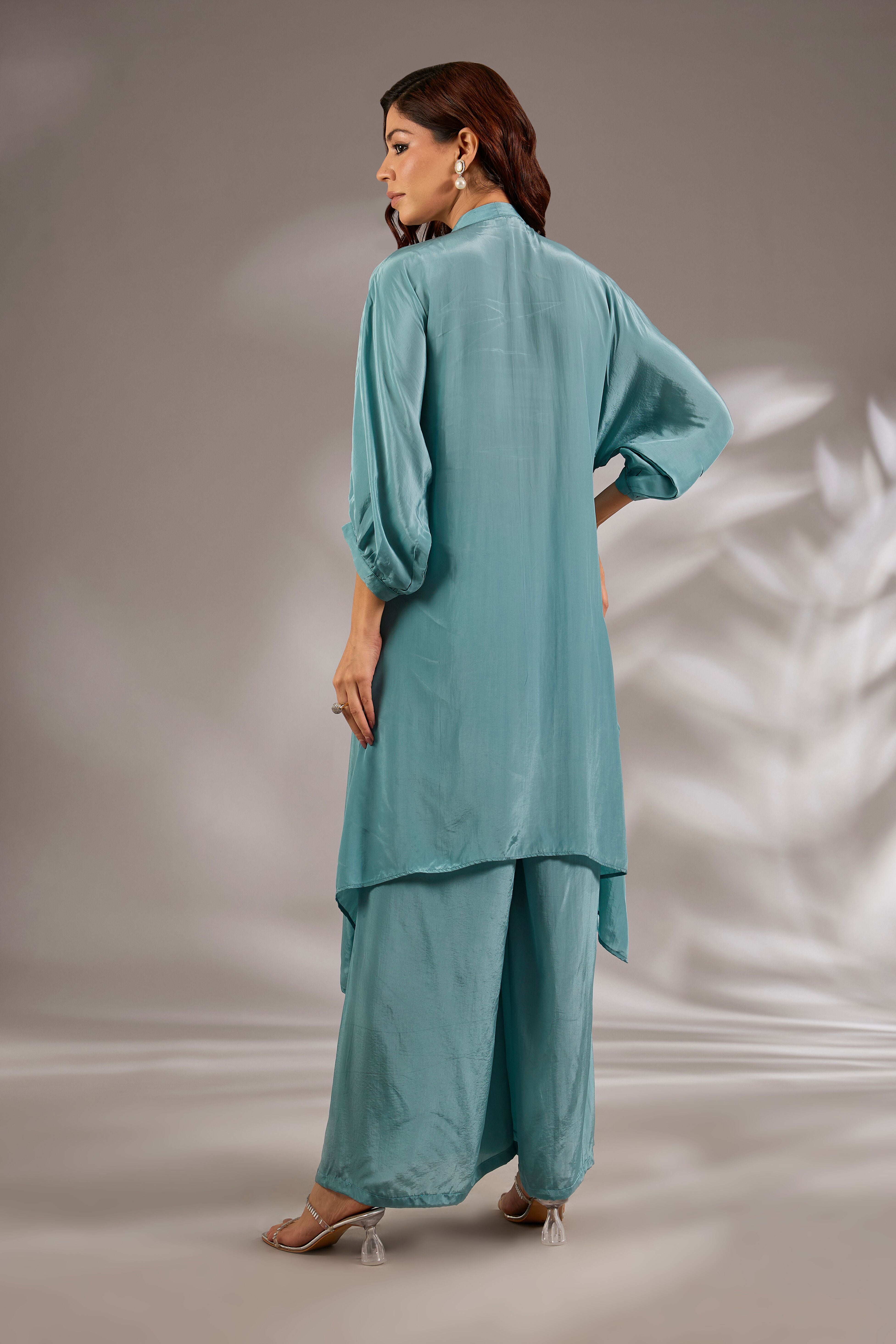 Asymmetric kurta in crepe base with sequins embroidery.