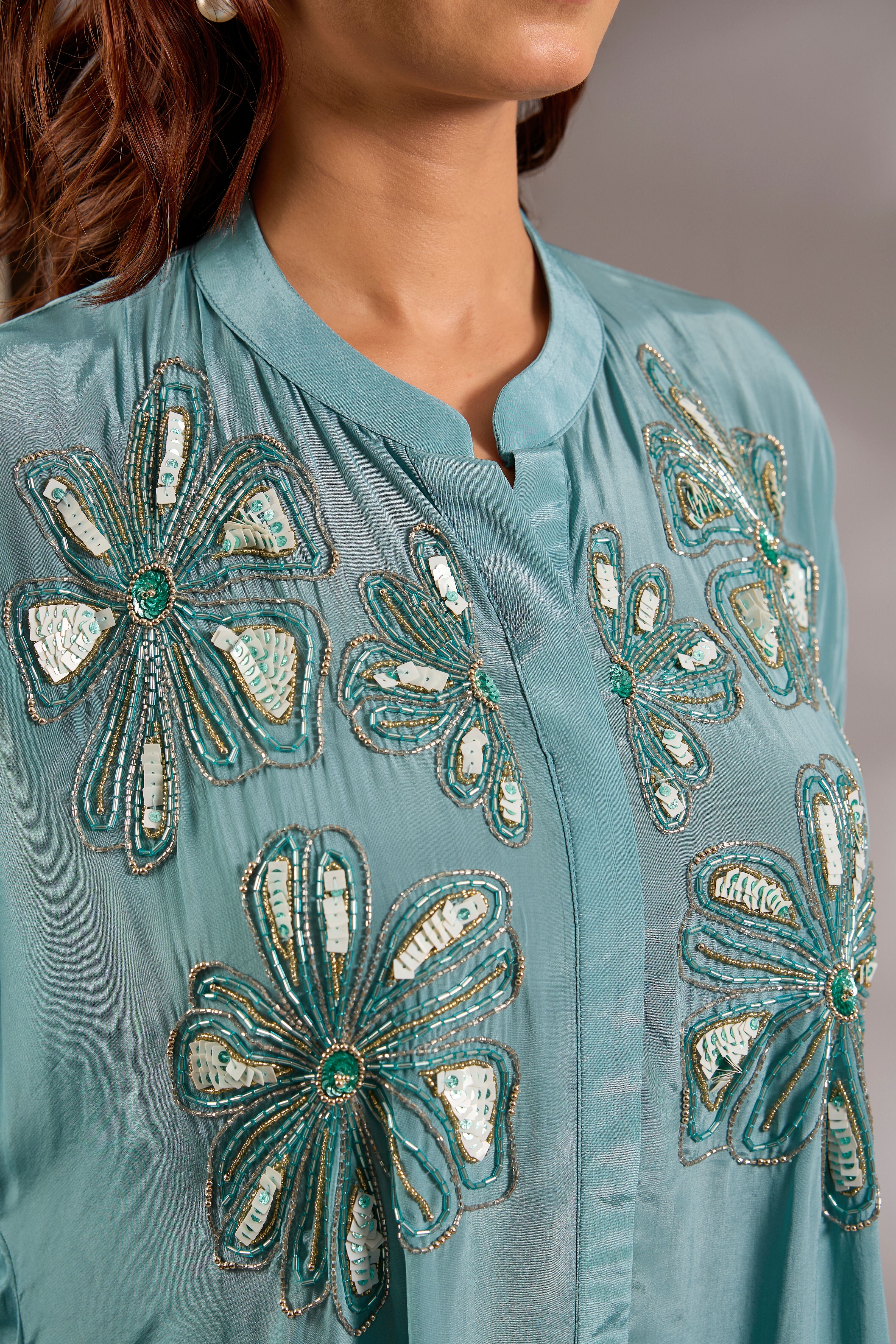 Asymmetric kurta in crepe base with sequins embroidery.