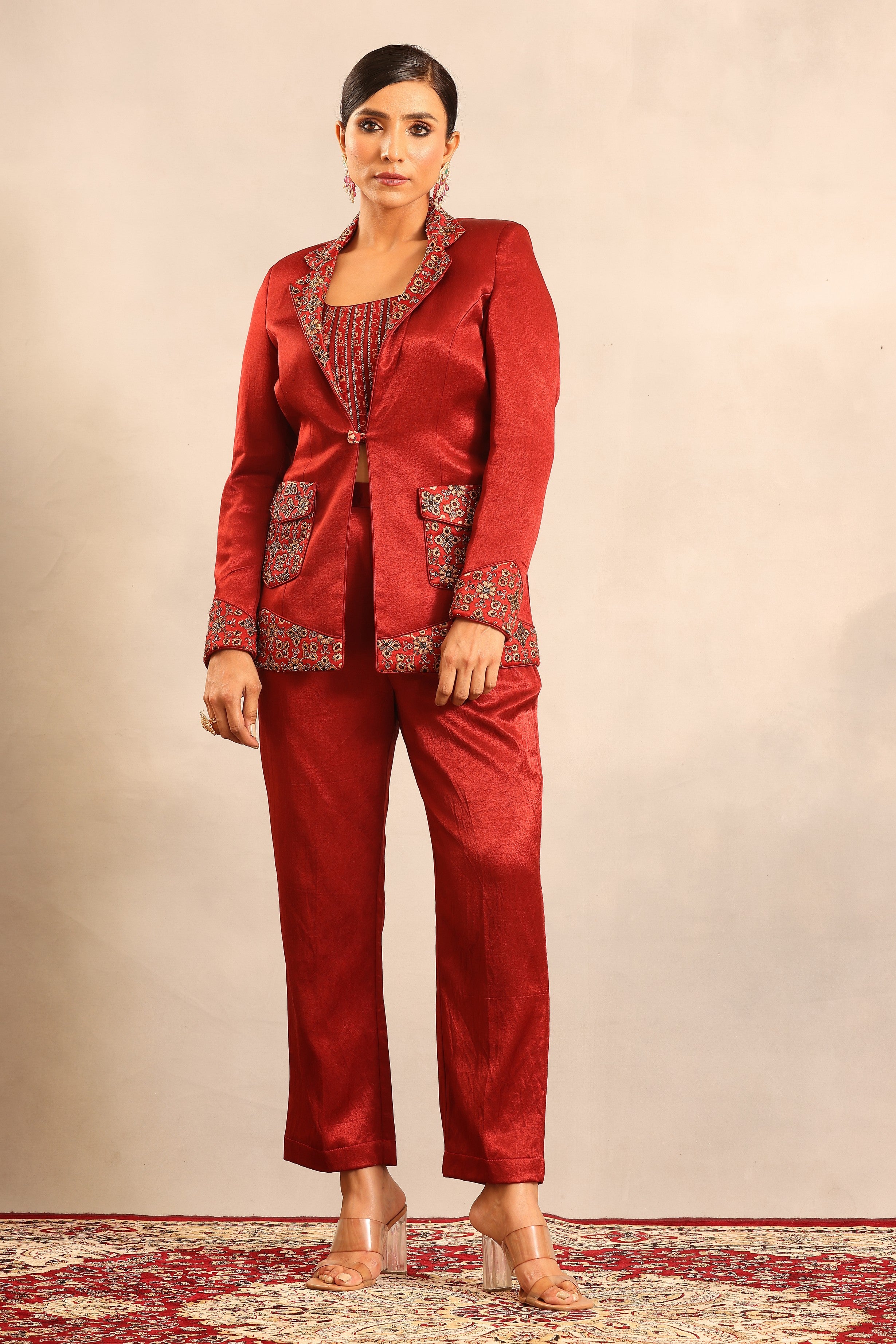 Maroon ajrakh embroidered stripwork blouse with embellished blazer and pants