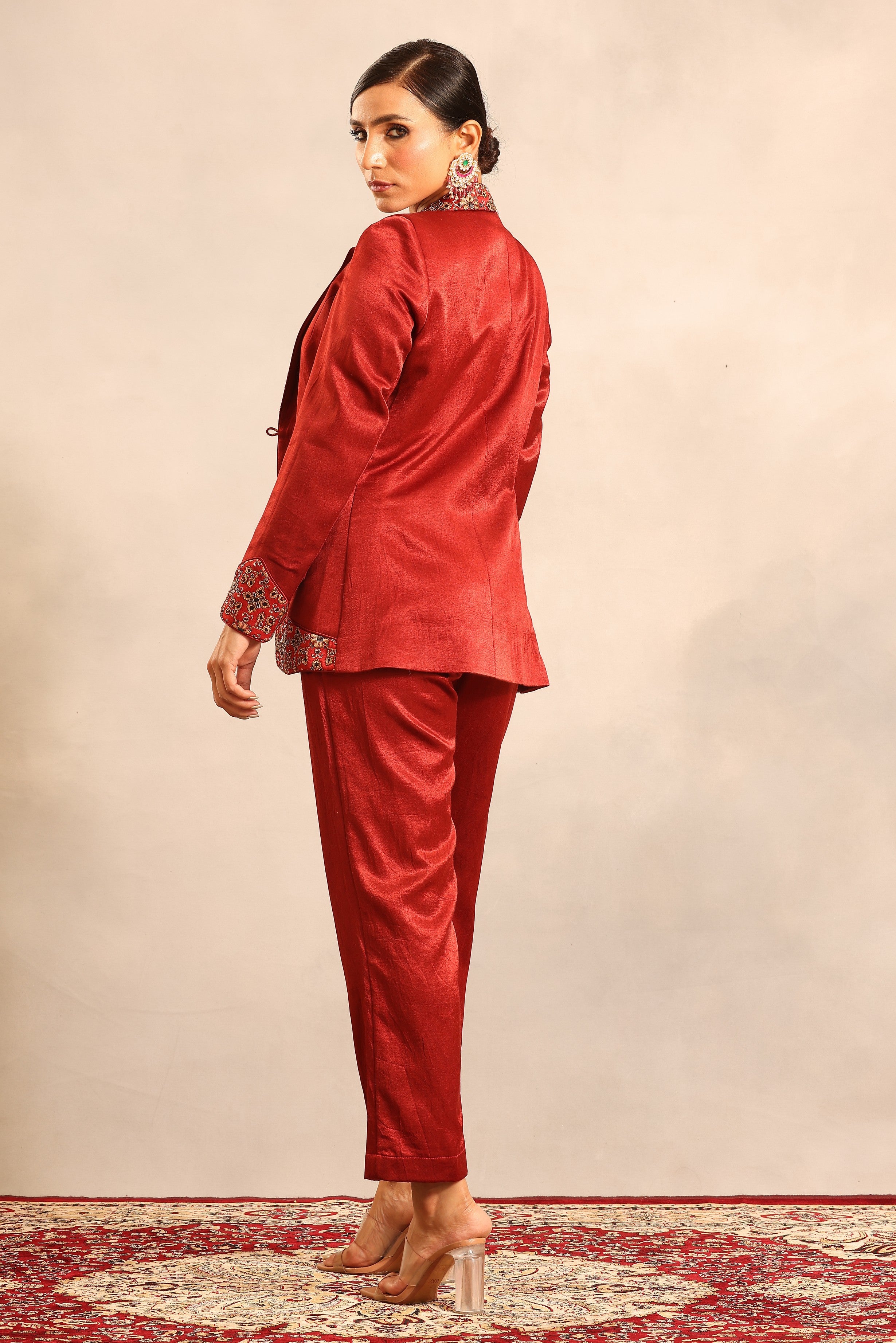 Maroon ajrakh embroidered stripwork blouse with embellished blazer and pants