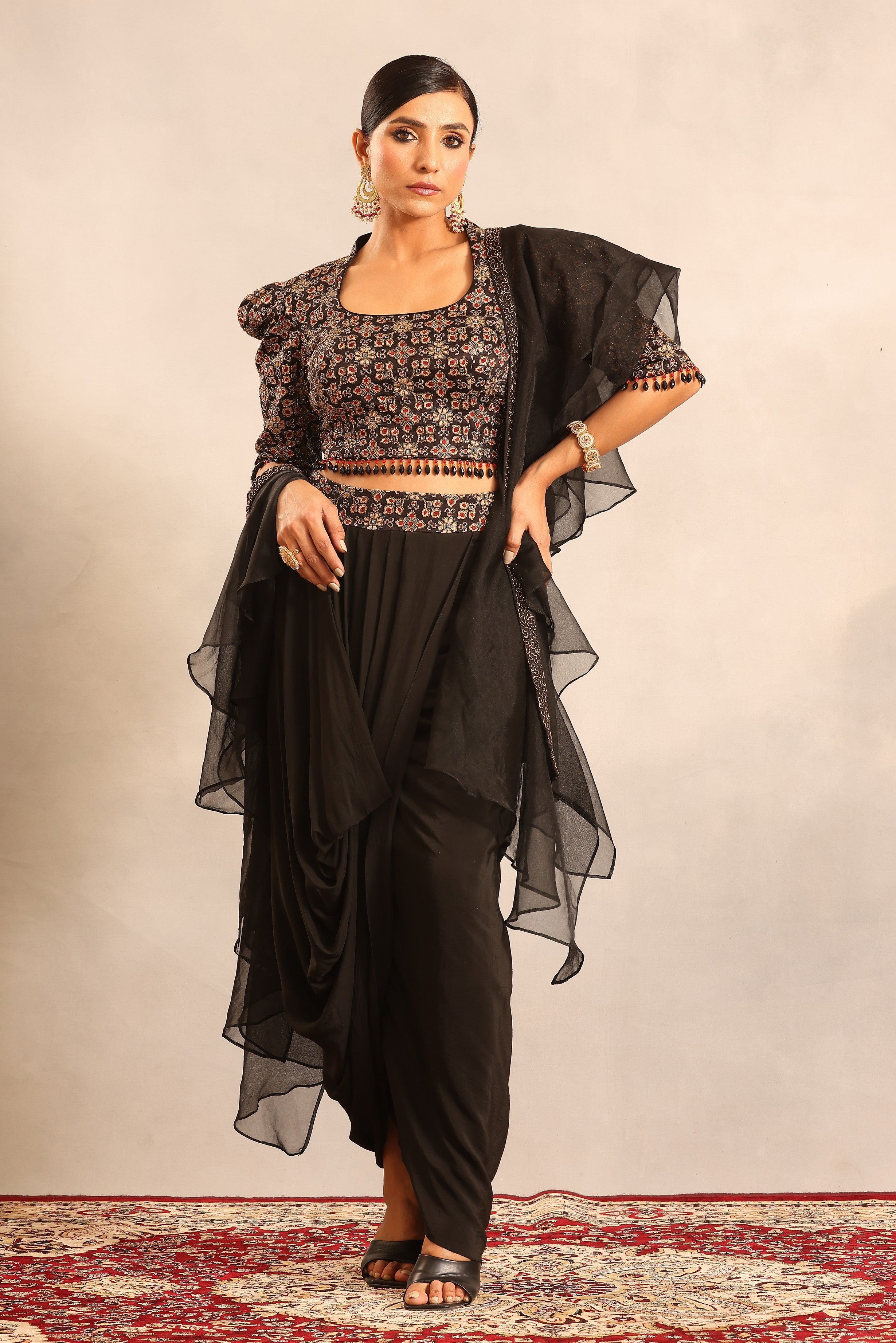 Black ajrakh embellished blouse with drape skirt and ruffle dupatta