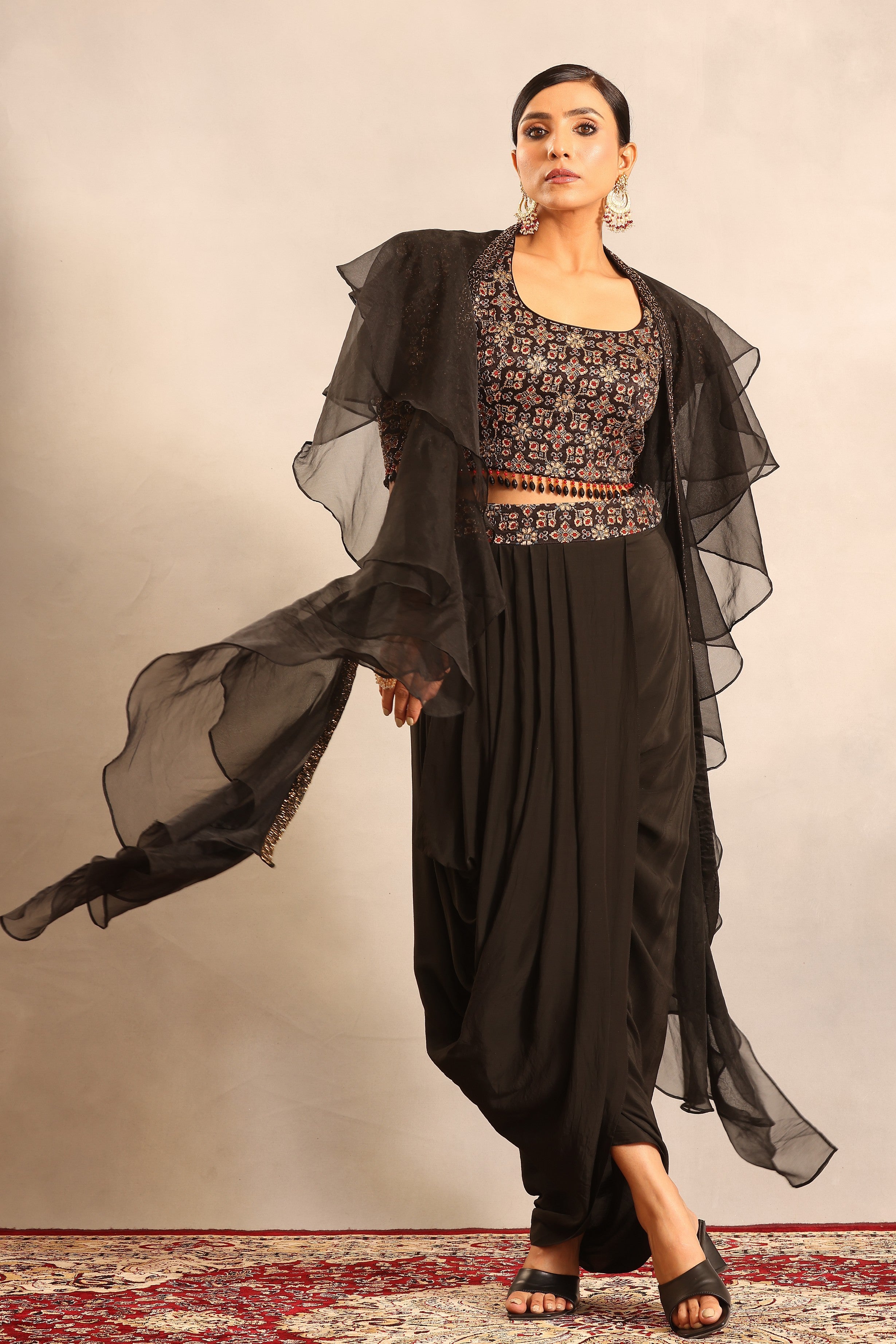 Black ajrakh embellished blouse with drape skirt and ruffle dupatta