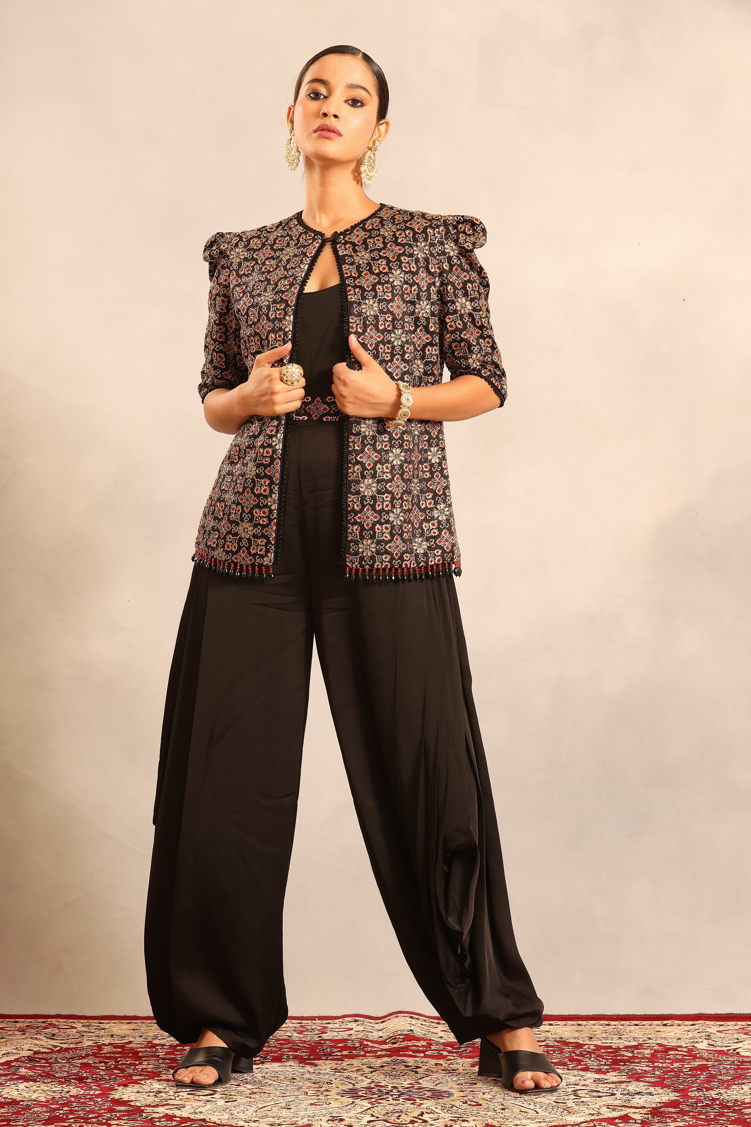 Black side cowl jumpsuit with Ajrakh embellished jacket and waistand