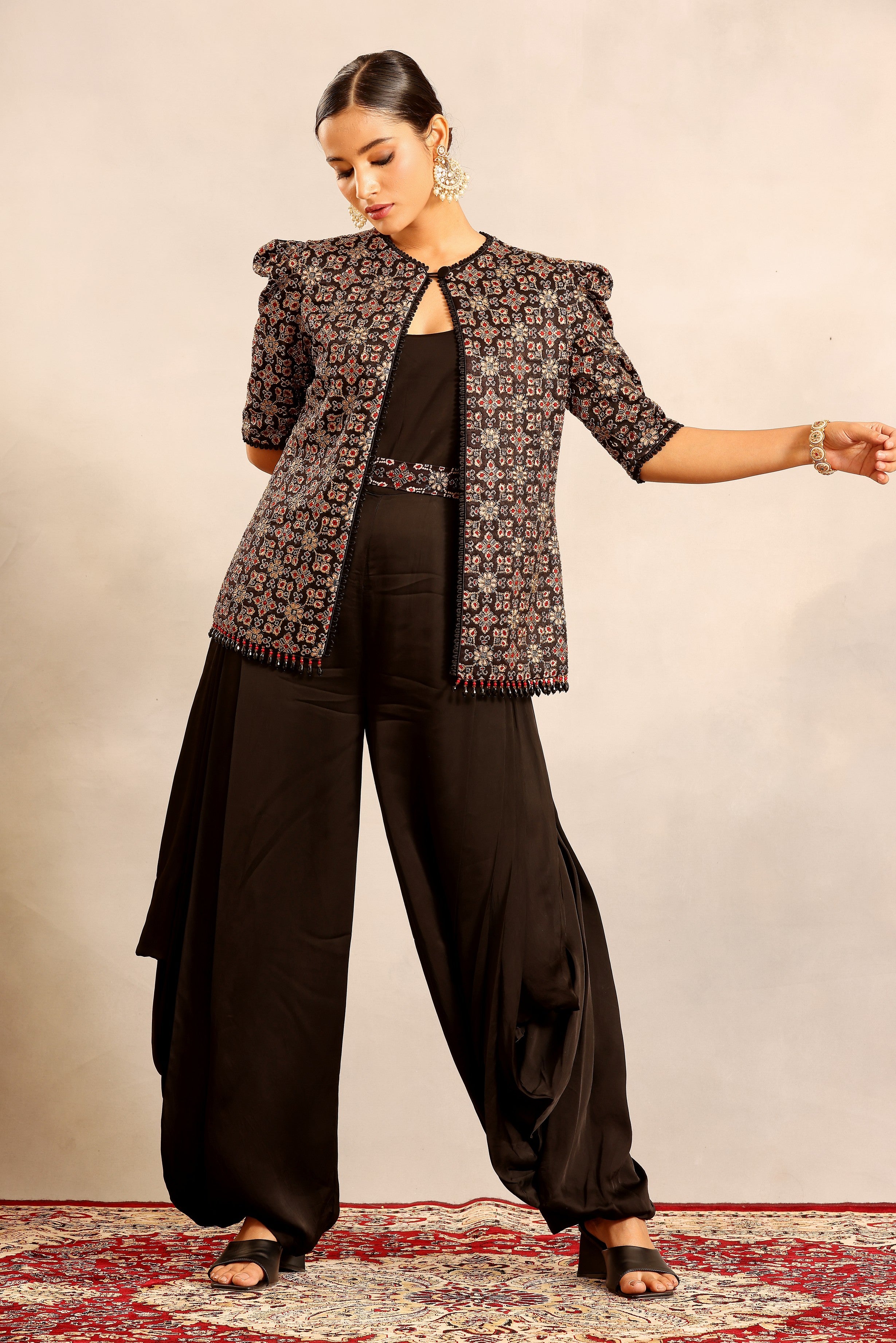 Black side cowl jumpsuit with Ajrakh embellished jacket and waistand