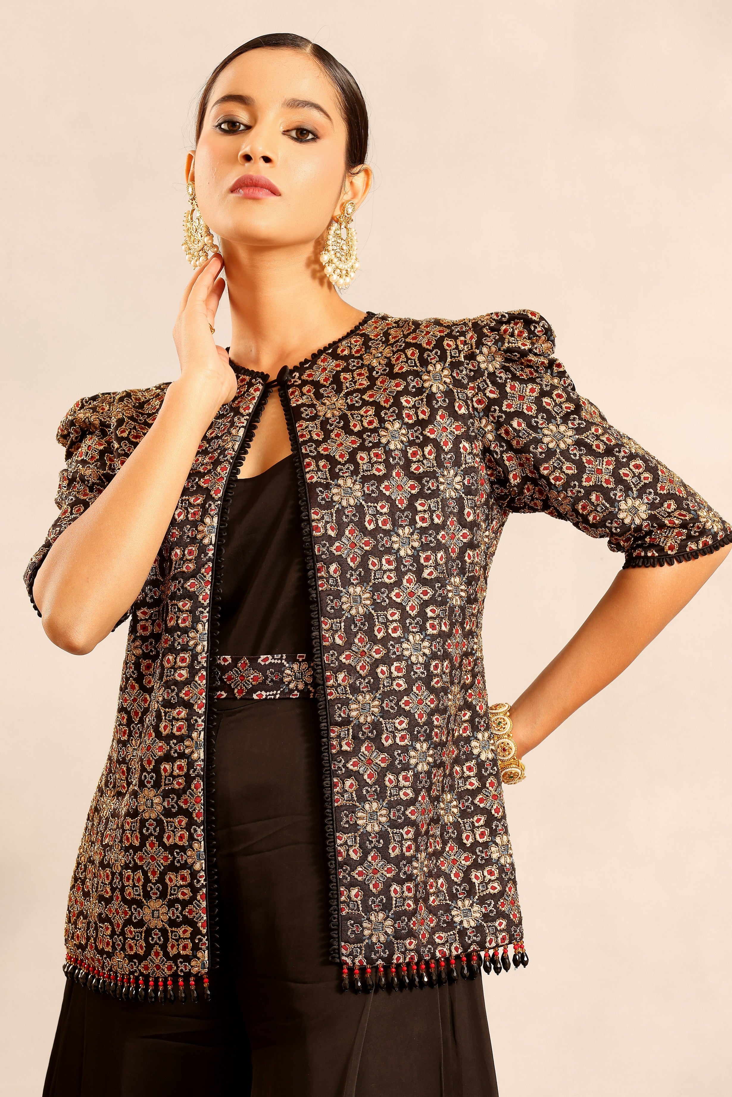 Black side cowl jumpsuit with Ajrakh embellished jacket and waistand