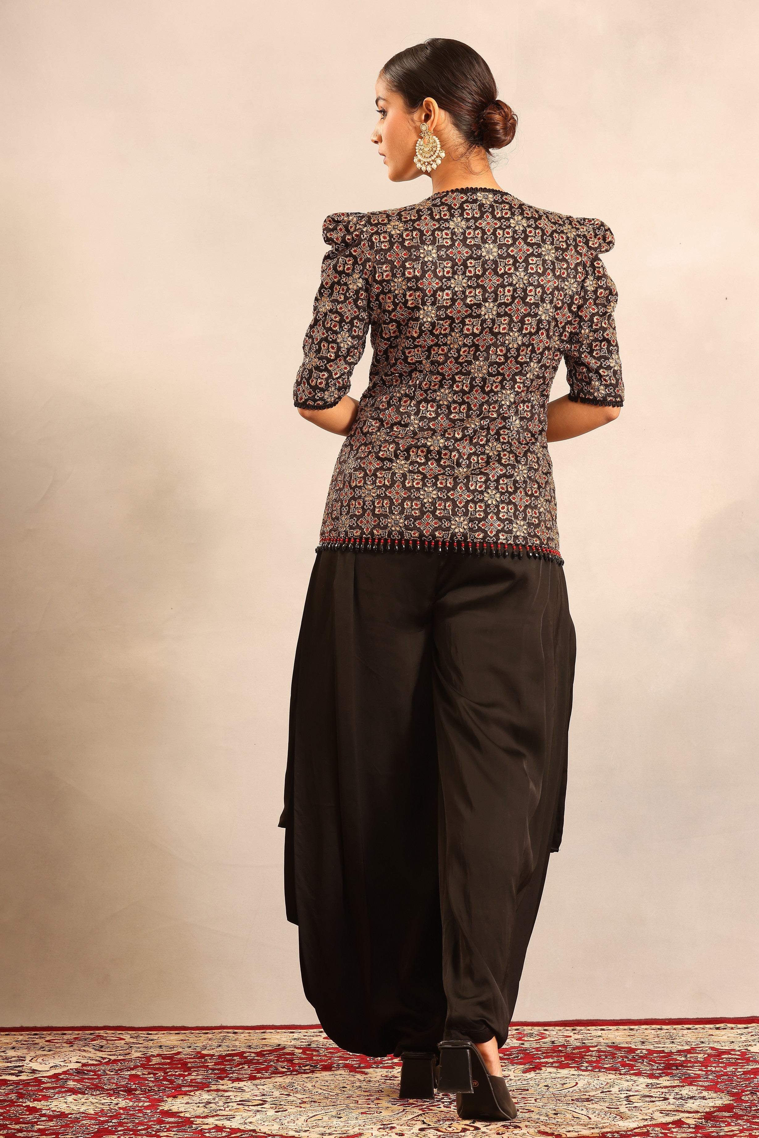 Black side cowl jumpsuit with Ajrakh embellished jacket and waistand