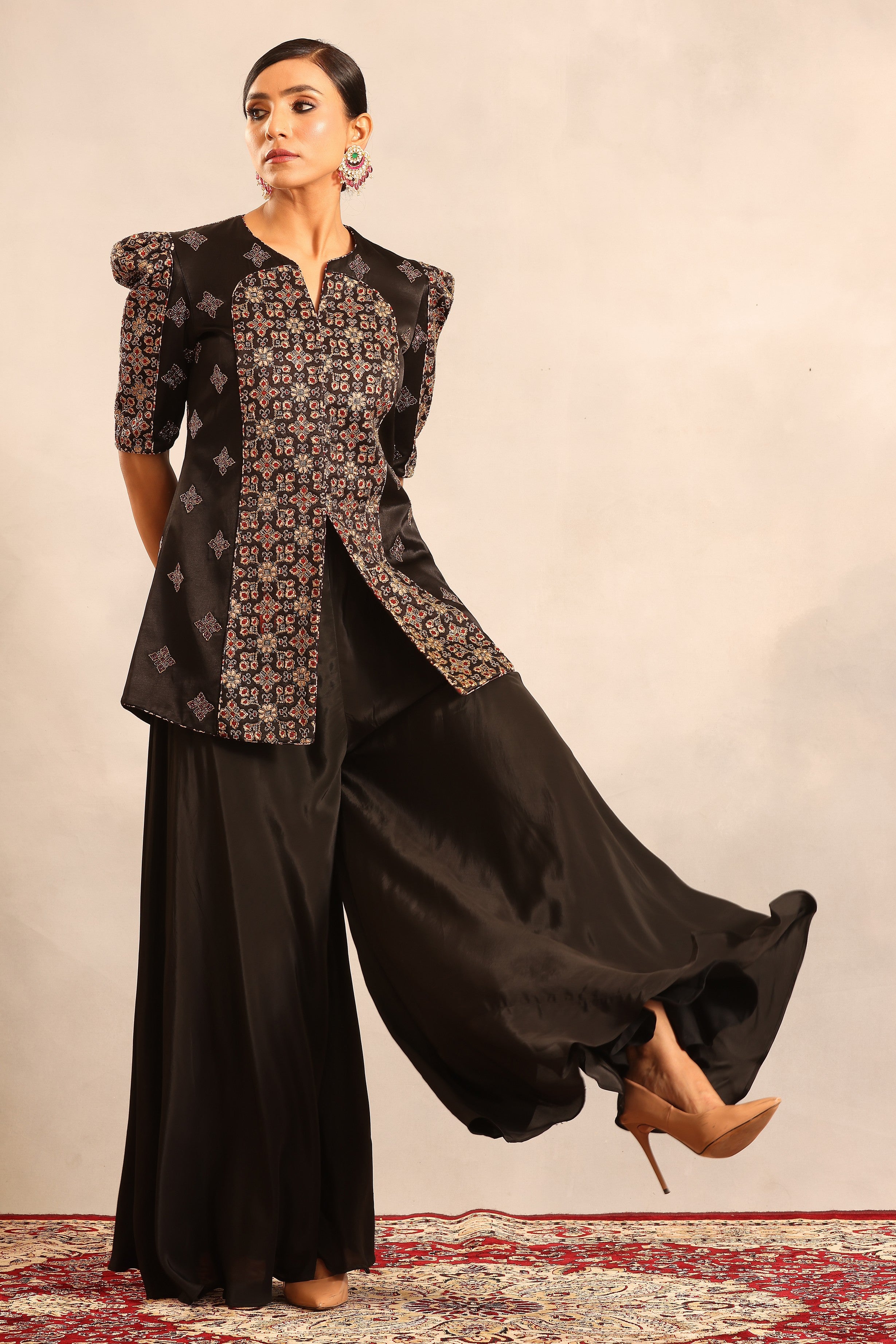 Black ajrakh embellished peplum jacket with flare pants