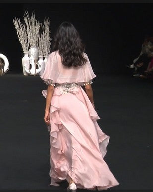 Peachy pink Ajrakh embroidered blouse paired up with Dhoti and ruffled dupatta