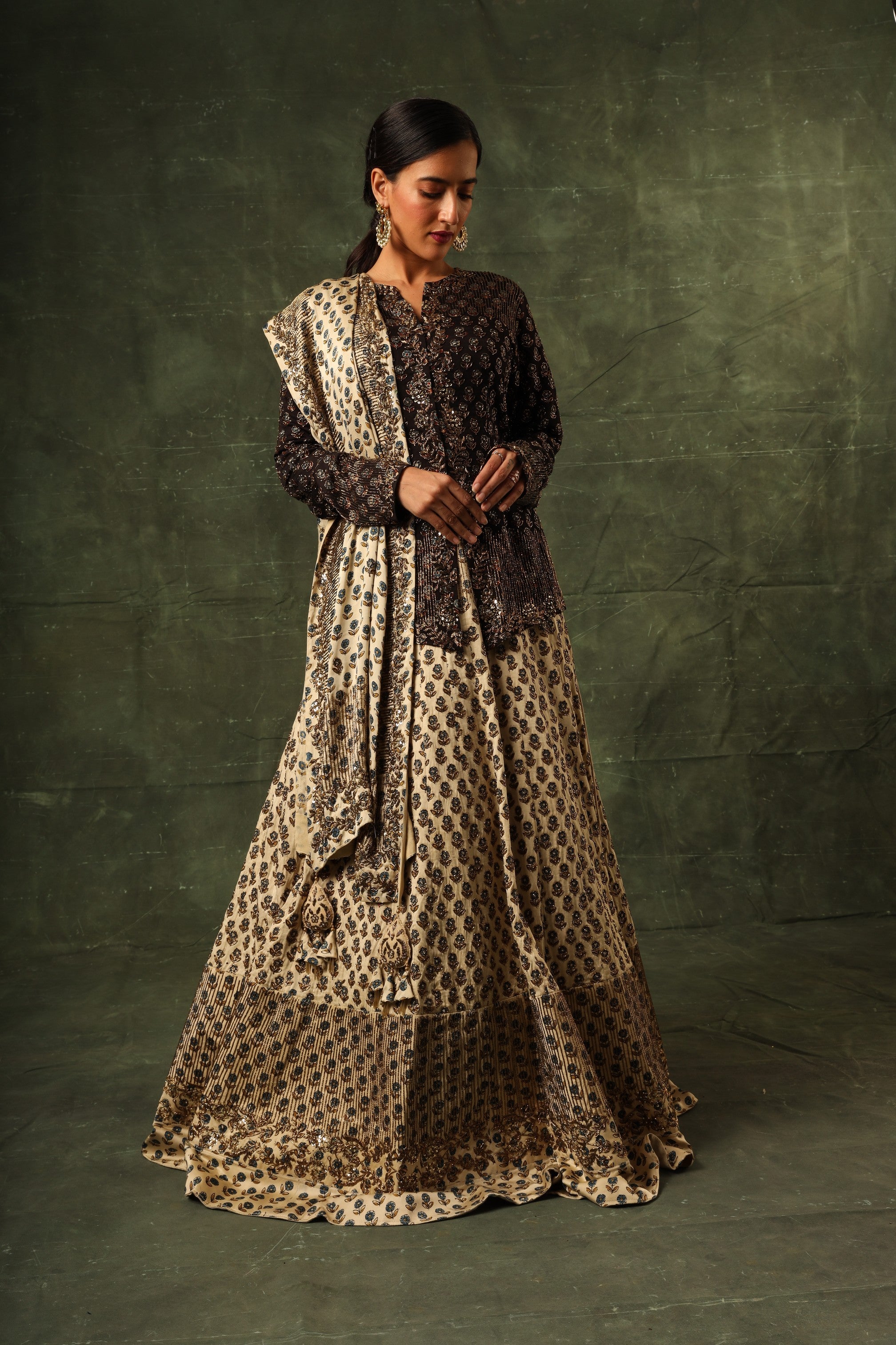 Black ajrakh jacket and Ivory lehenga with ivory ajrakh dupatta
