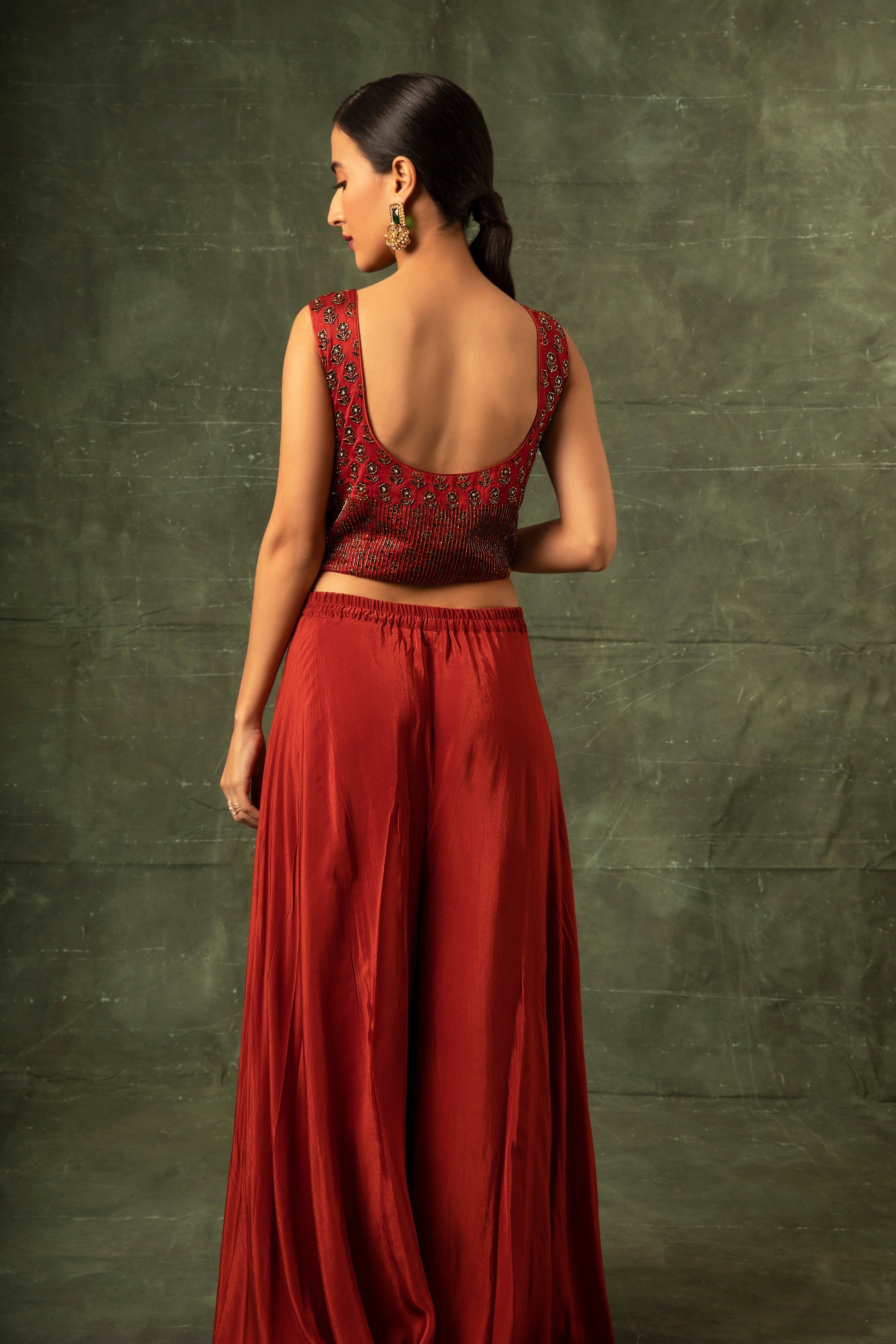 Red Ajrakh blouse and double layered flare pants with cape dupatta