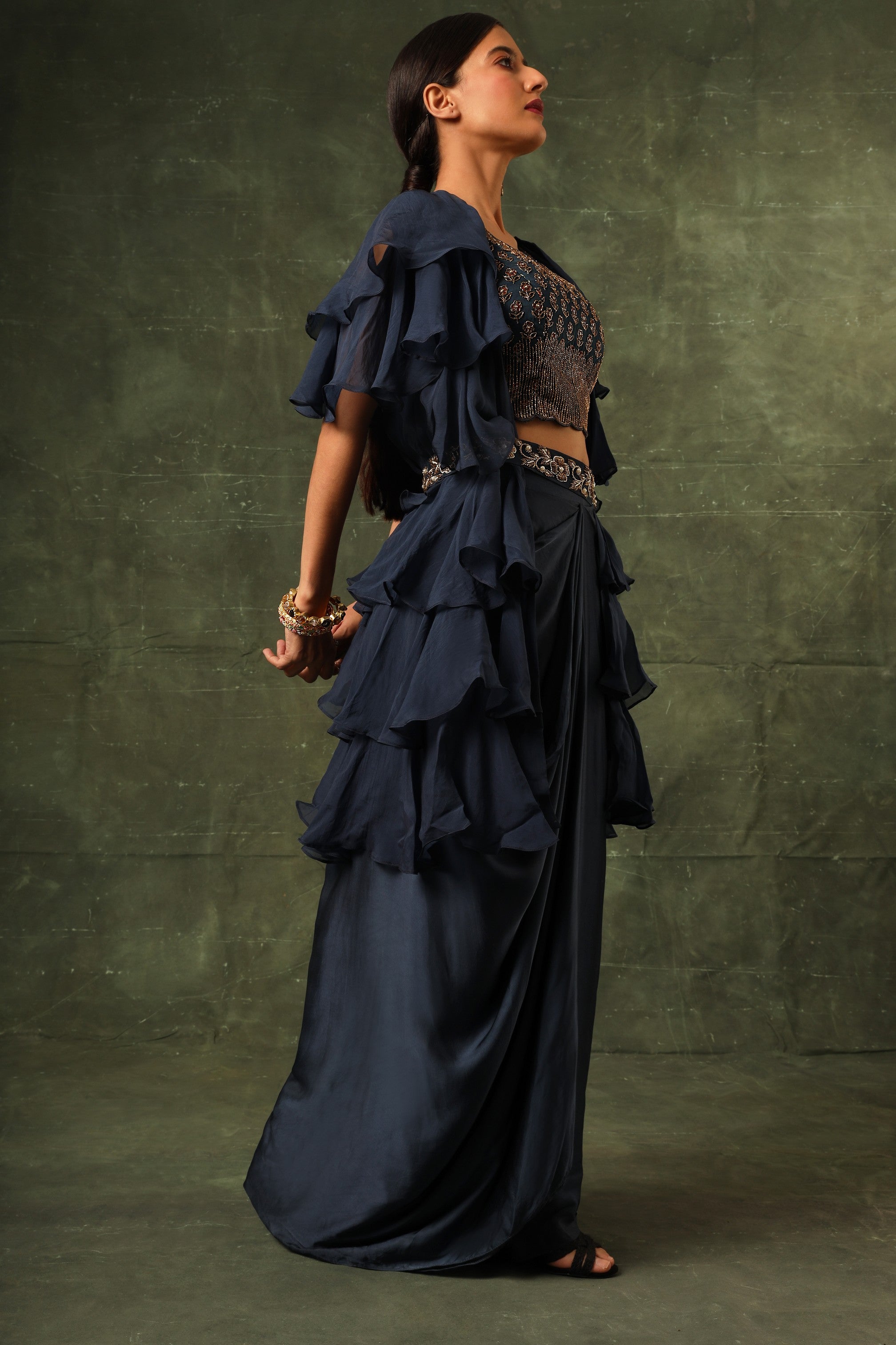 Blue Ajrakh blouse and layered jacket with embroiderd waisrband and drape dhoti