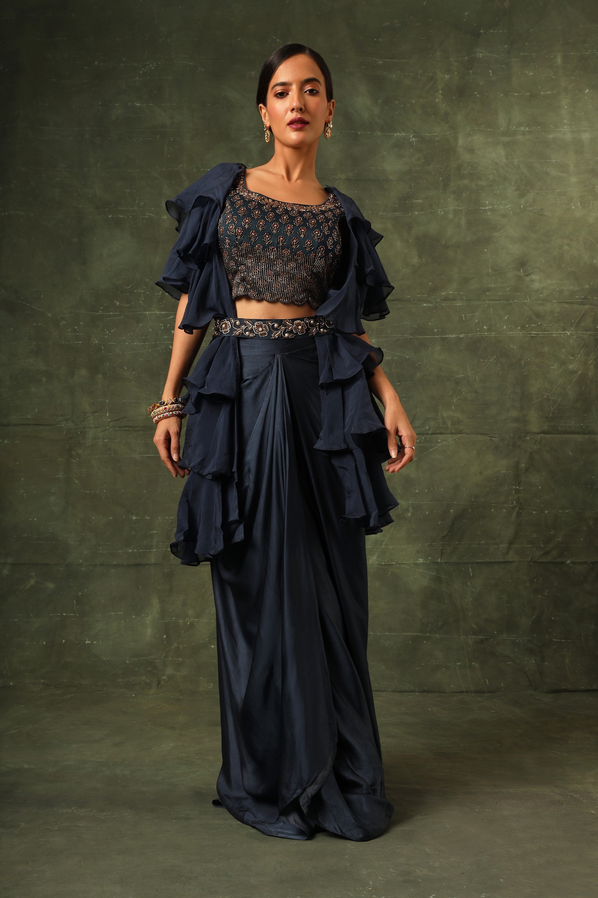 Blue Ajrakh blouse and layered jacket with embroiderd waisrband and drape dhoti