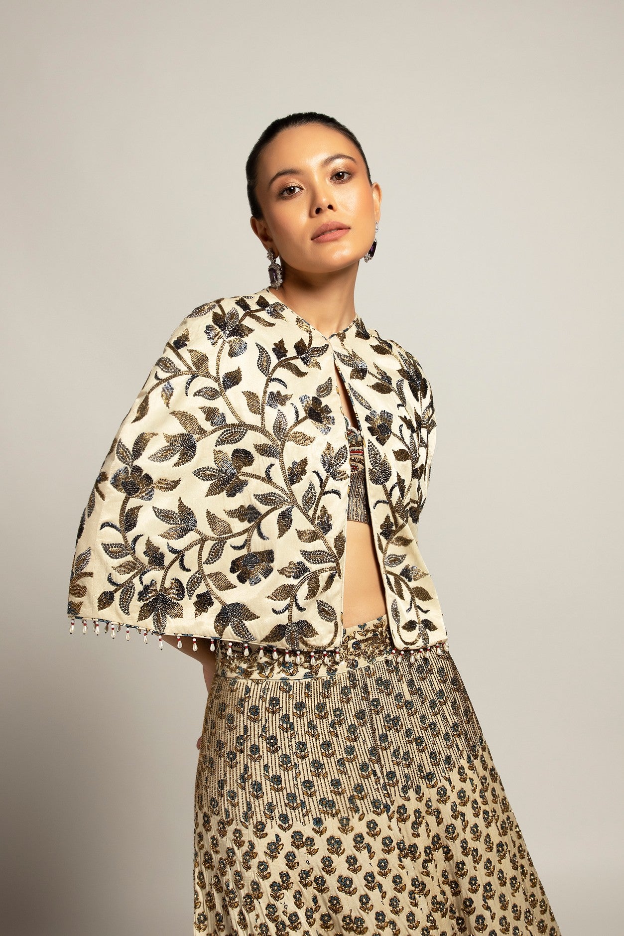 Lissome faded ivory blouse & Cape with Comely lehenga