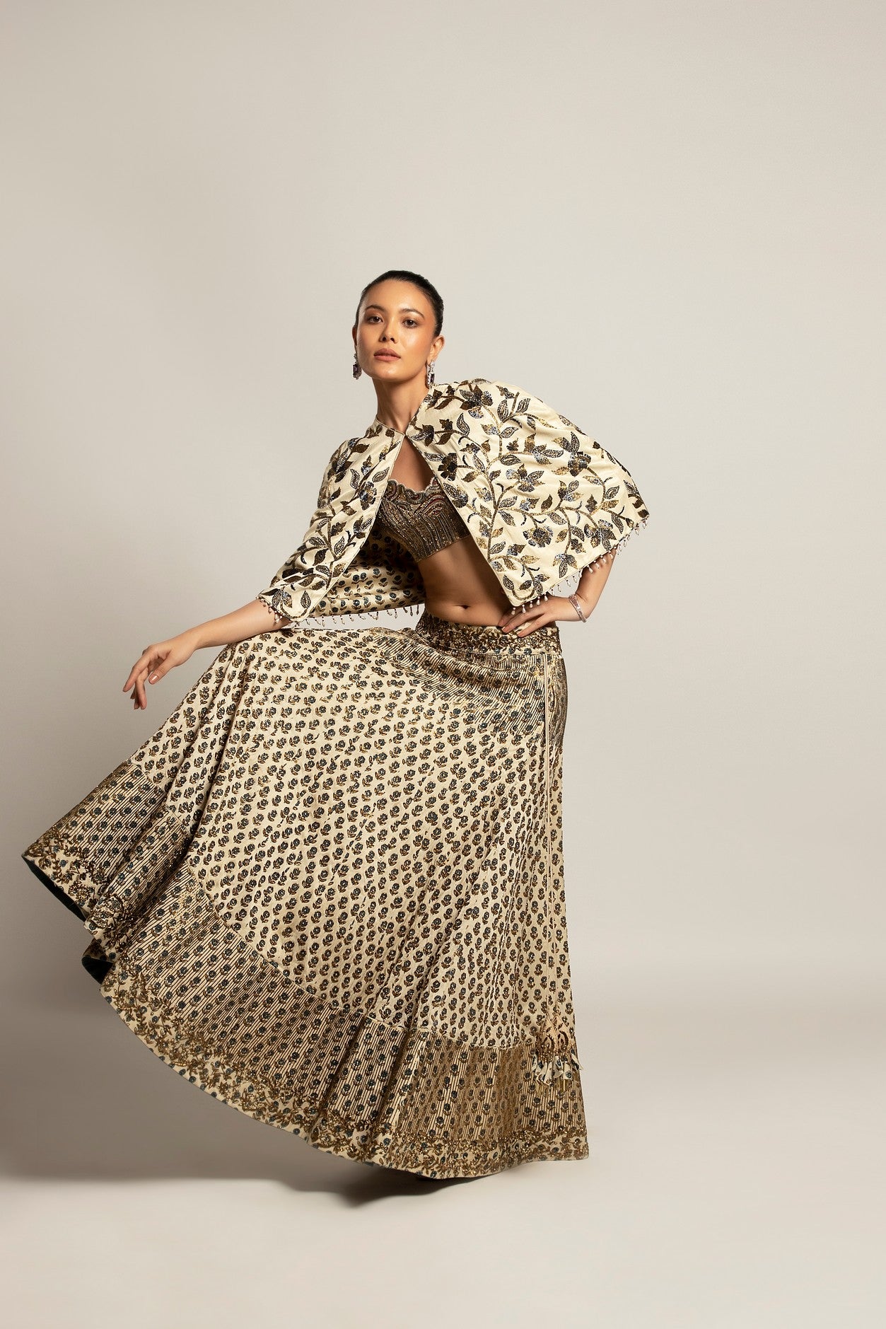 Lissome faded ivory blouse & Cape with Comely lehenga