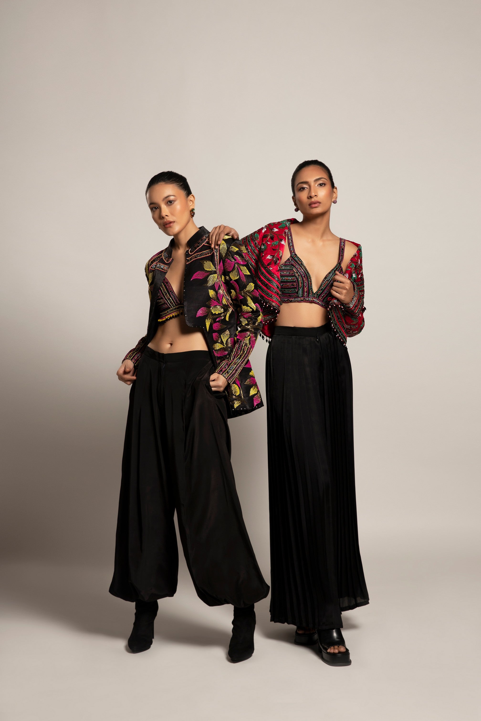 Unequaled Black bralet & Fuscia pink Cape jacket with Royal Black pleated pants