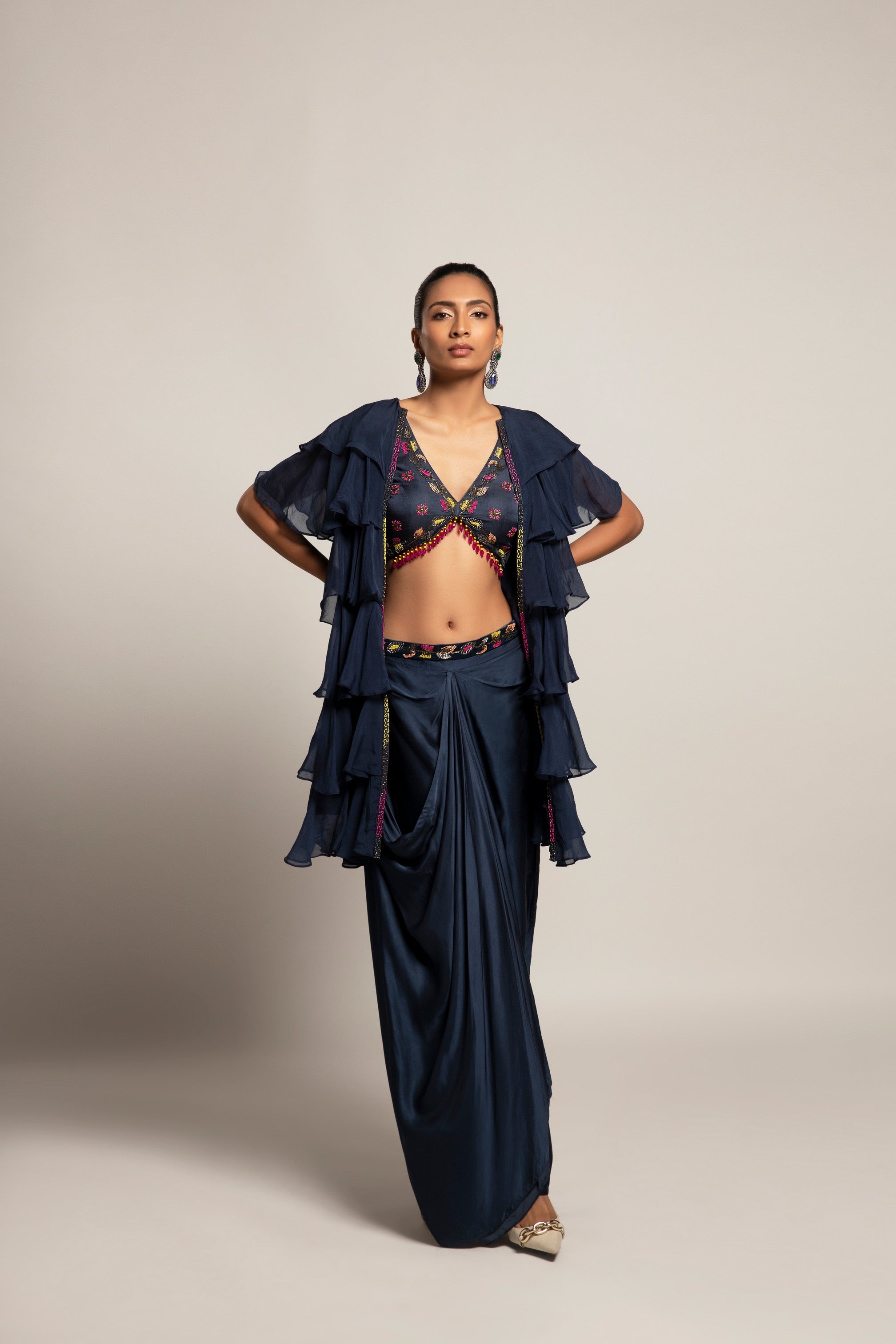 Ravishing Navy blue blouse and drape skirt with fine layered organza jacket