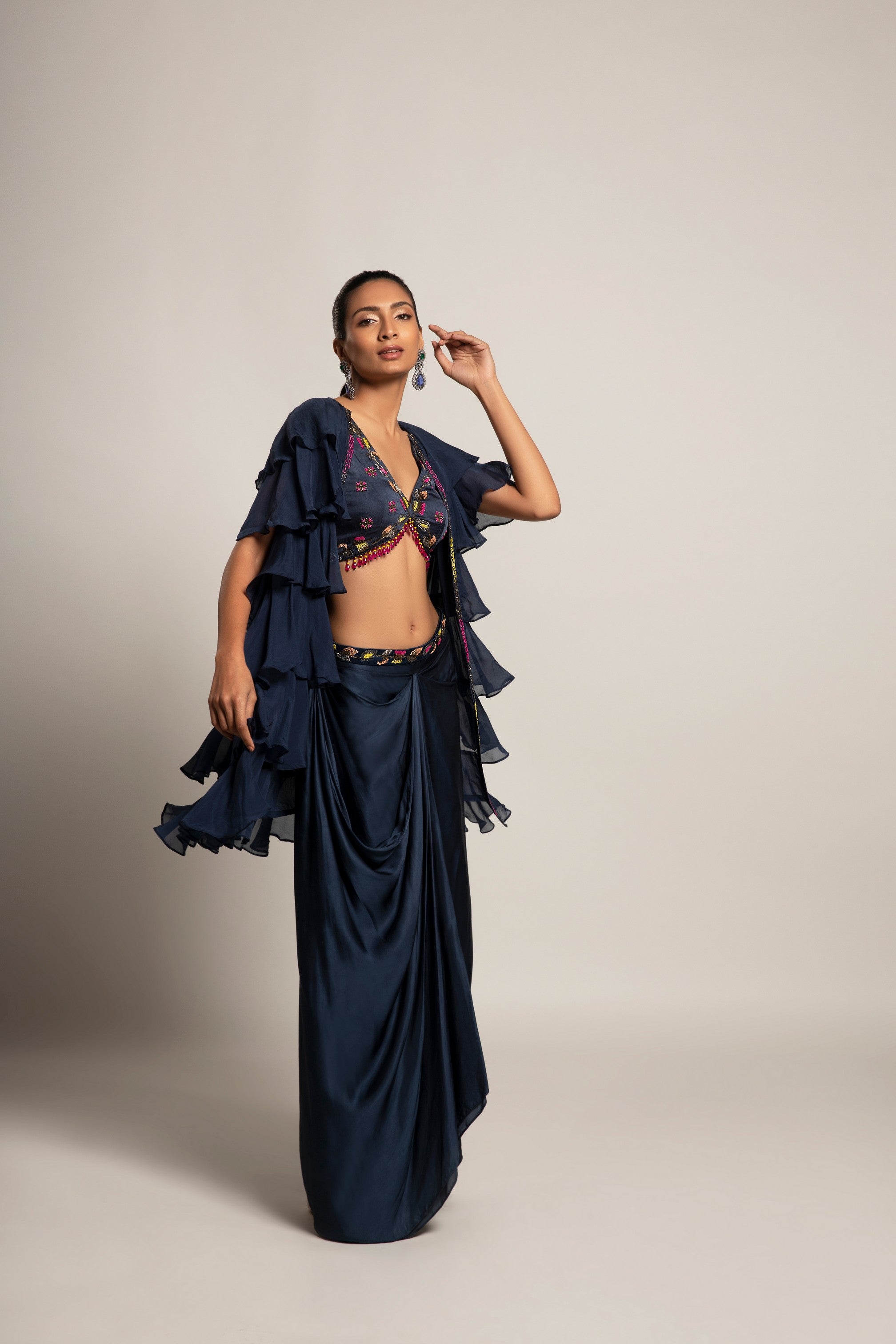Ravishing Navy blue blouse and drape skirt with fine layered organza jacket