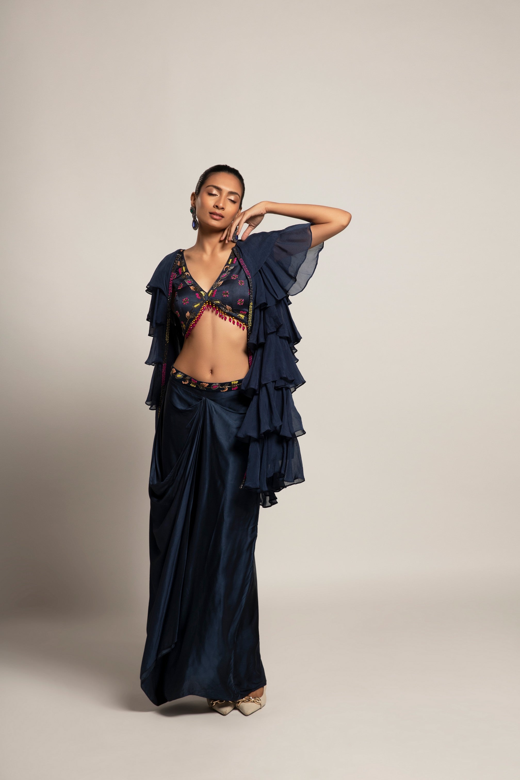 Ravishing Navy blue blouse and drape skirt with fine layered organza jacket