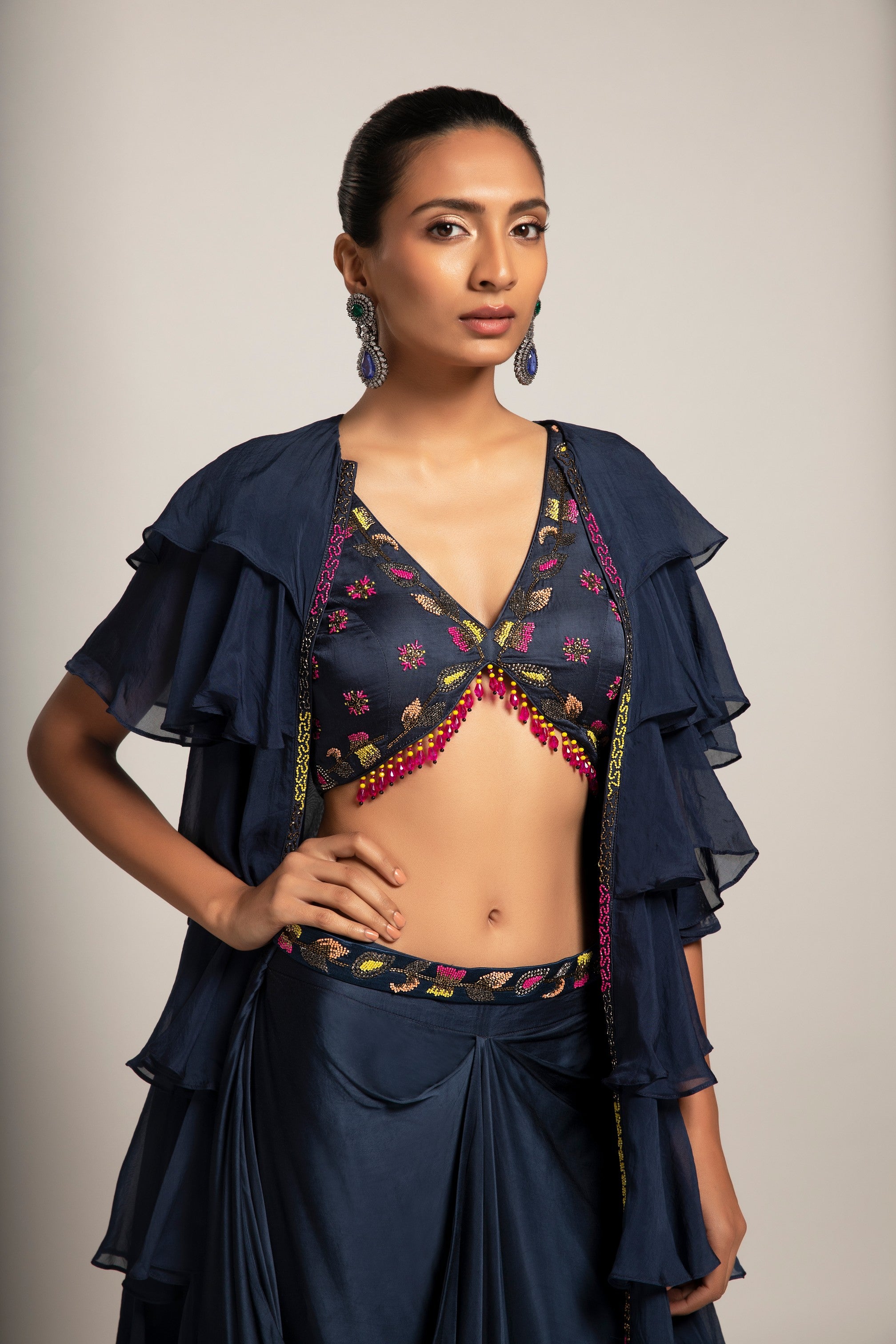 Ravishing Navy blue blouse and drape skirt with fine layered organza jacket
