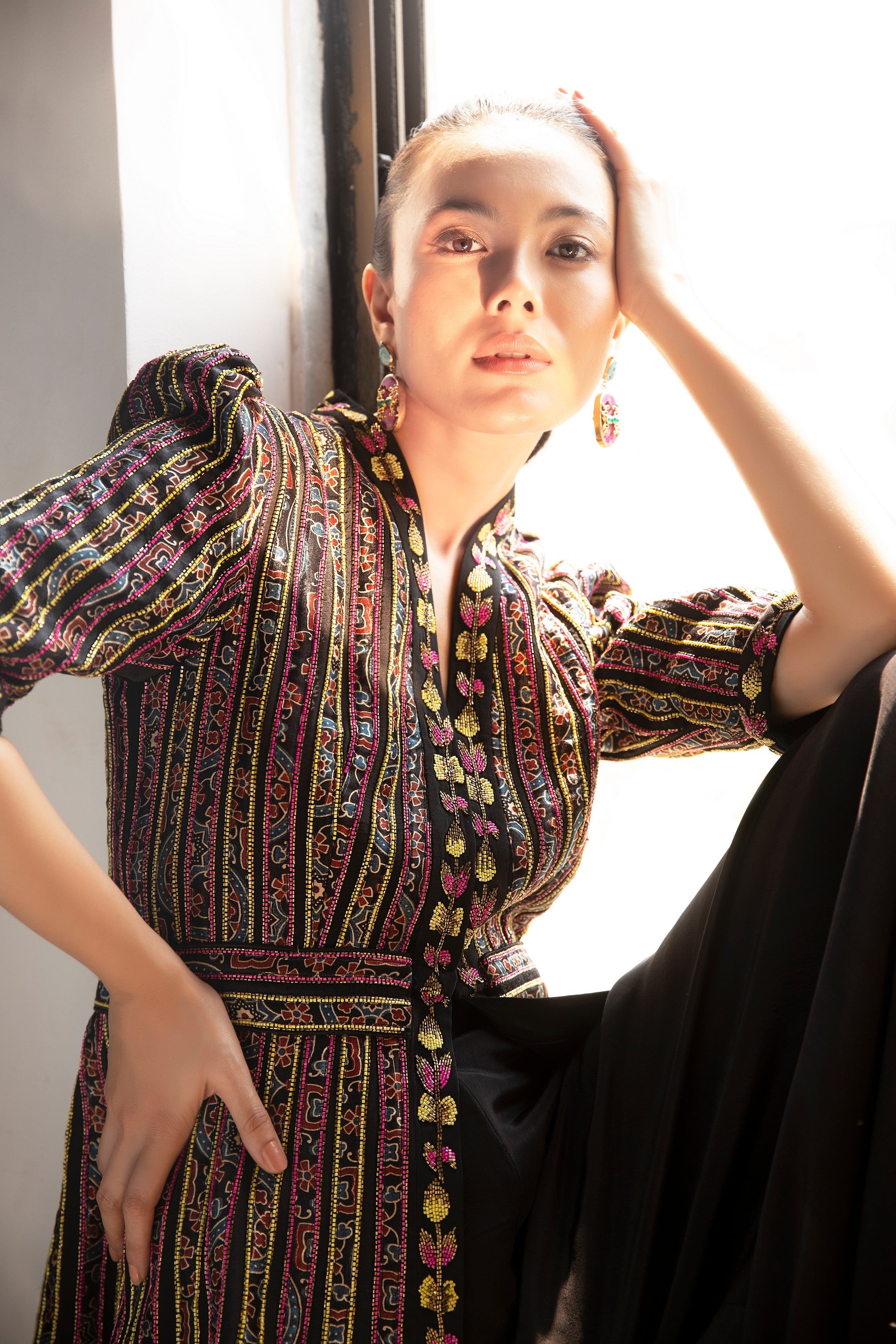 Delectable peplum top with black flare pants