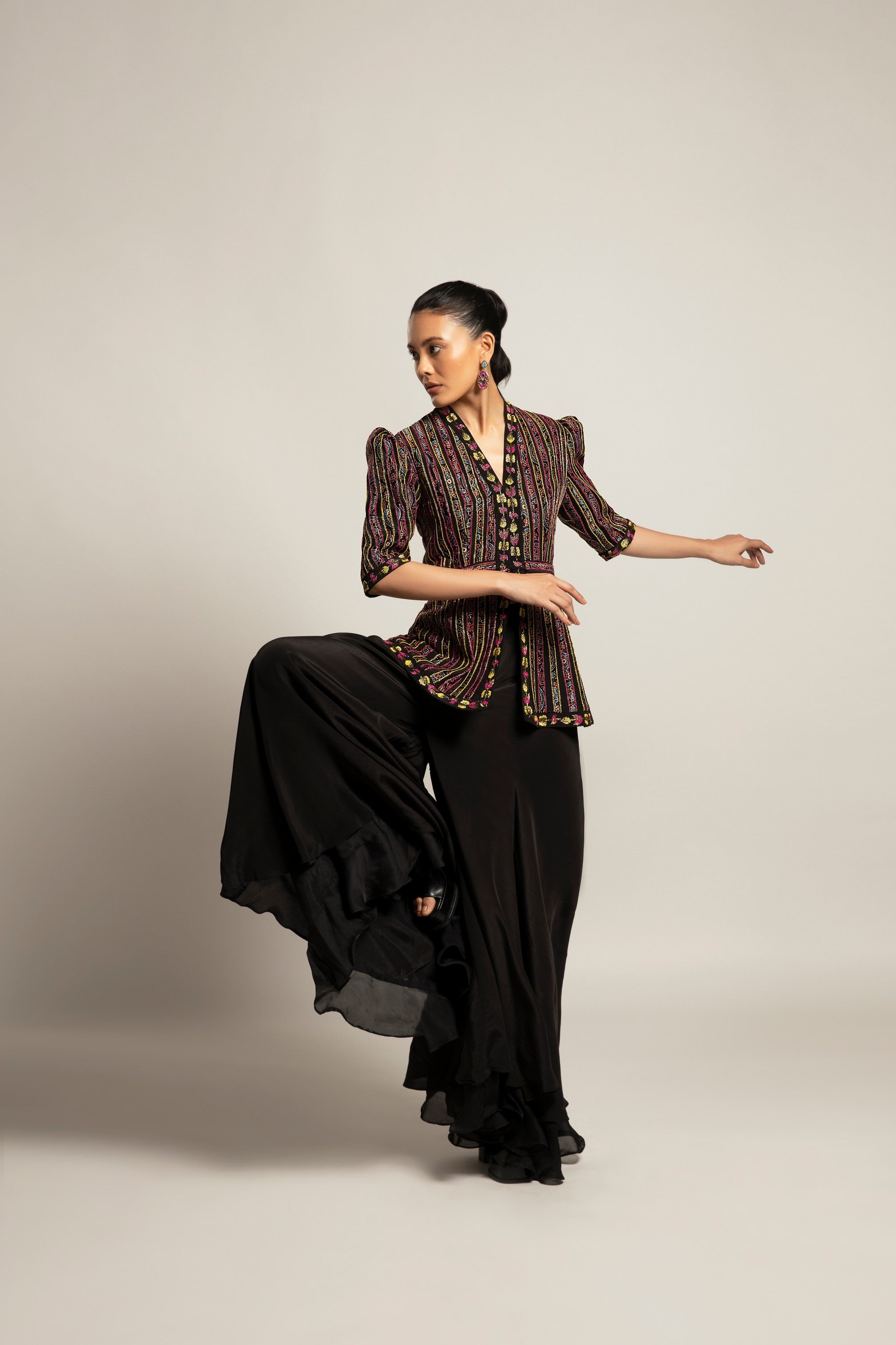 Delectable peplum top with black flare pants
