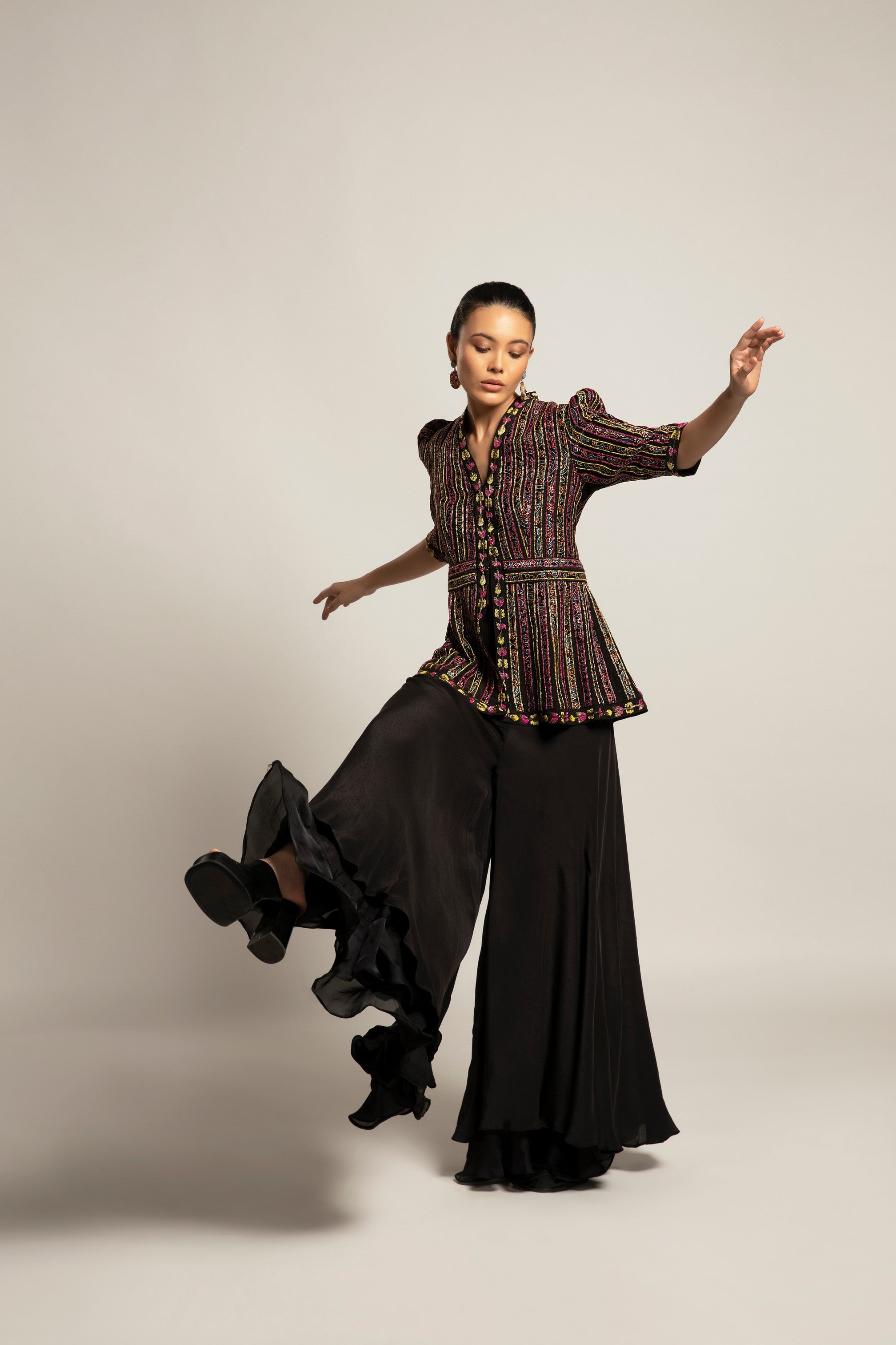 Delectable peplum top with black flare pants