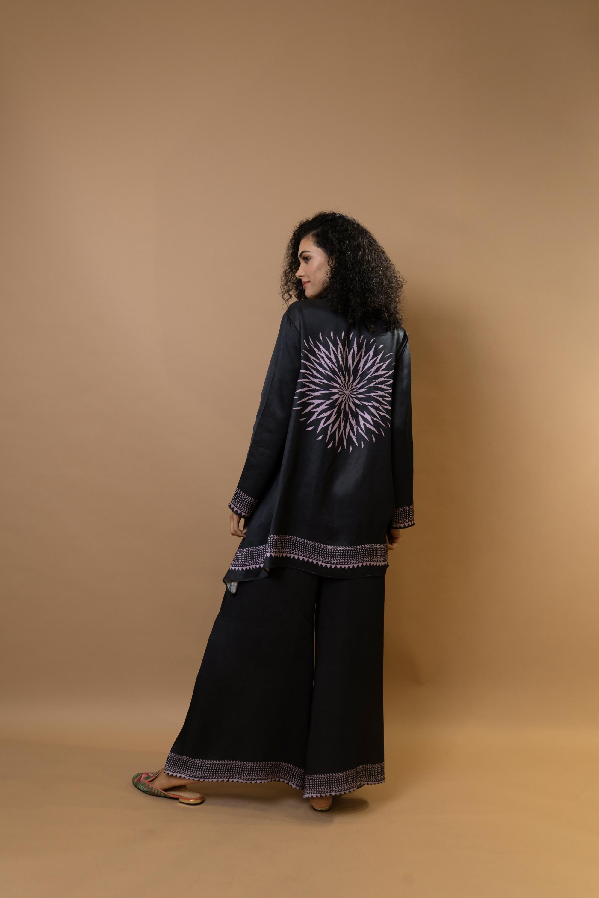 A black bold and stylish block-printed asymmetric shirt,