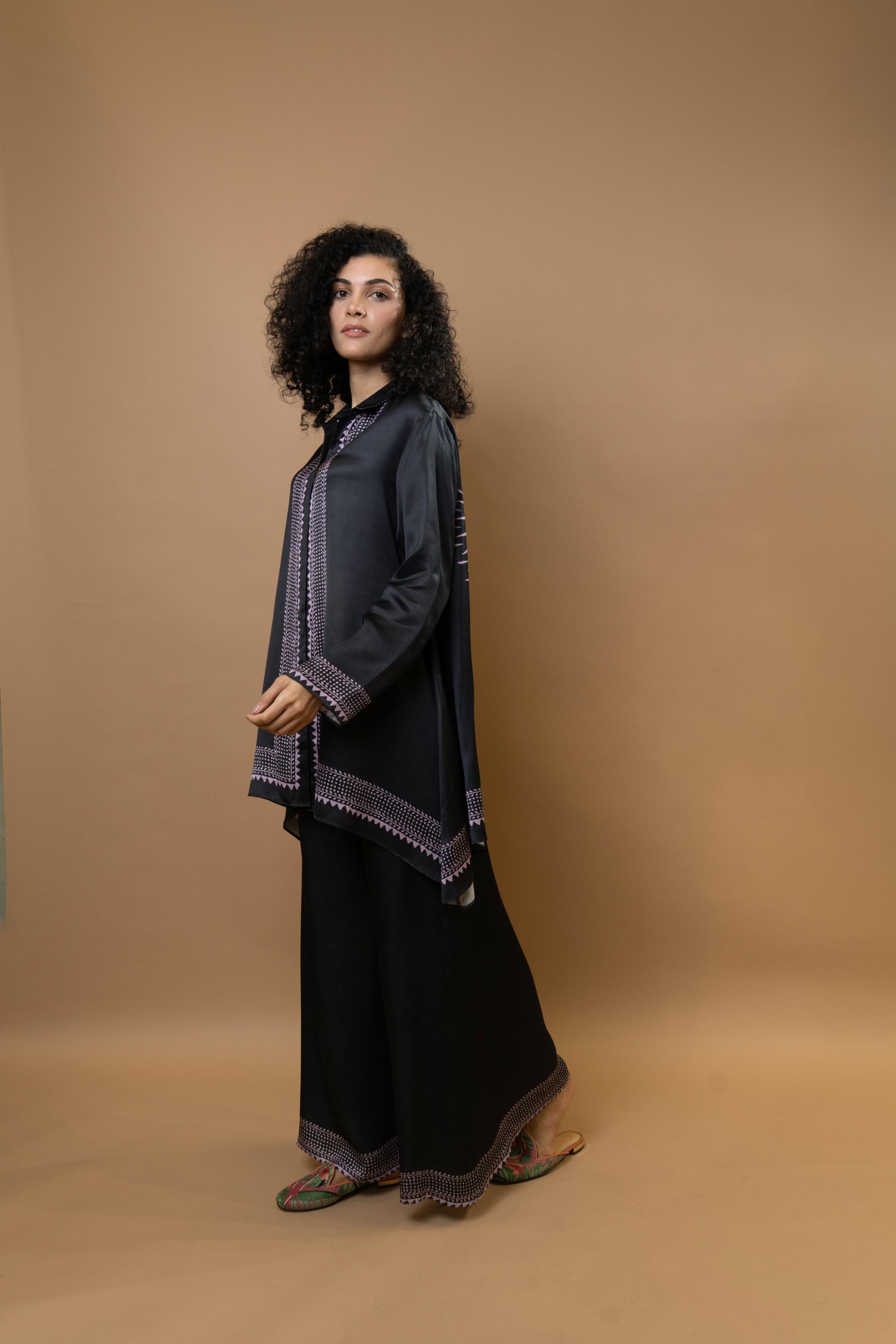 A black bold and stylish block-printed asymmetric shirt,