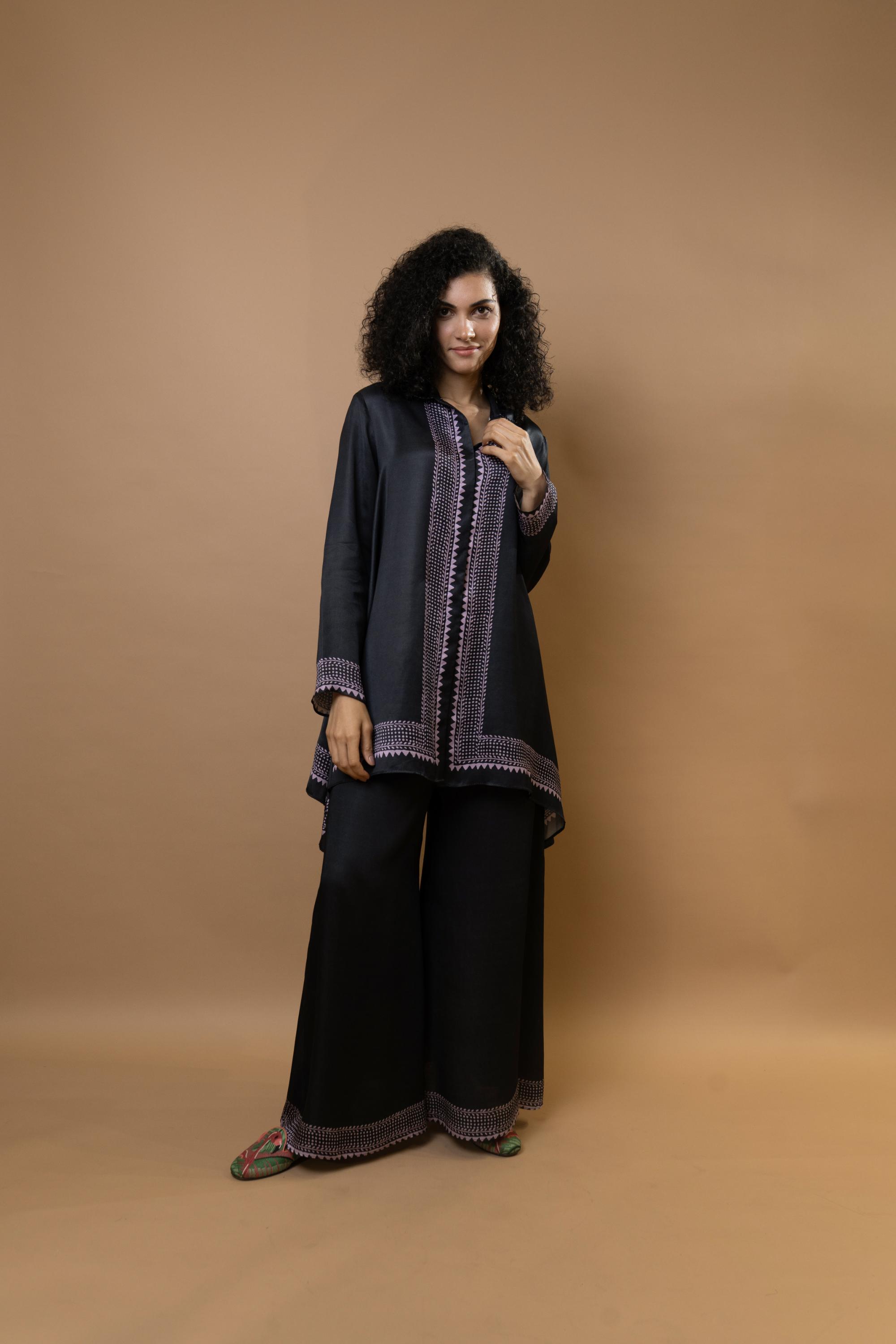 A black bold and stylish block-printed asymmetric shirt,