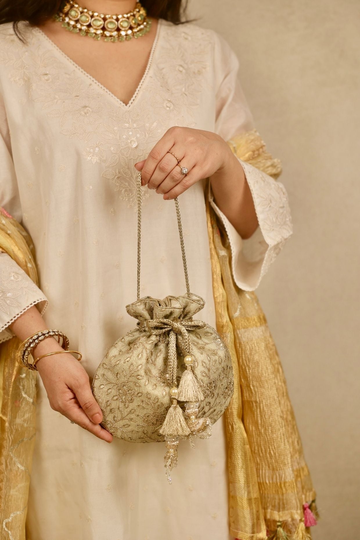 Tarang cutwork potli - Light gold