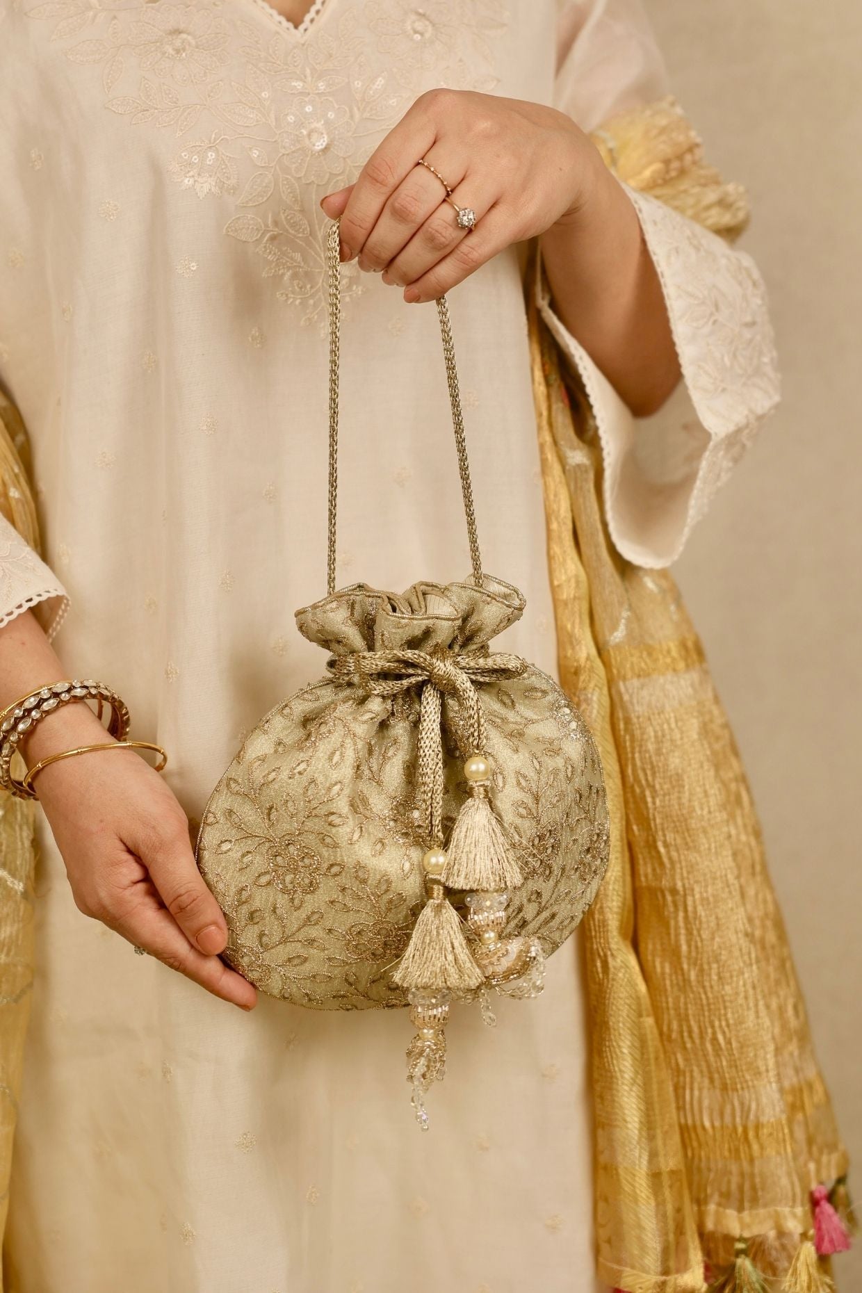 Tarang cutwork potli - Light gold