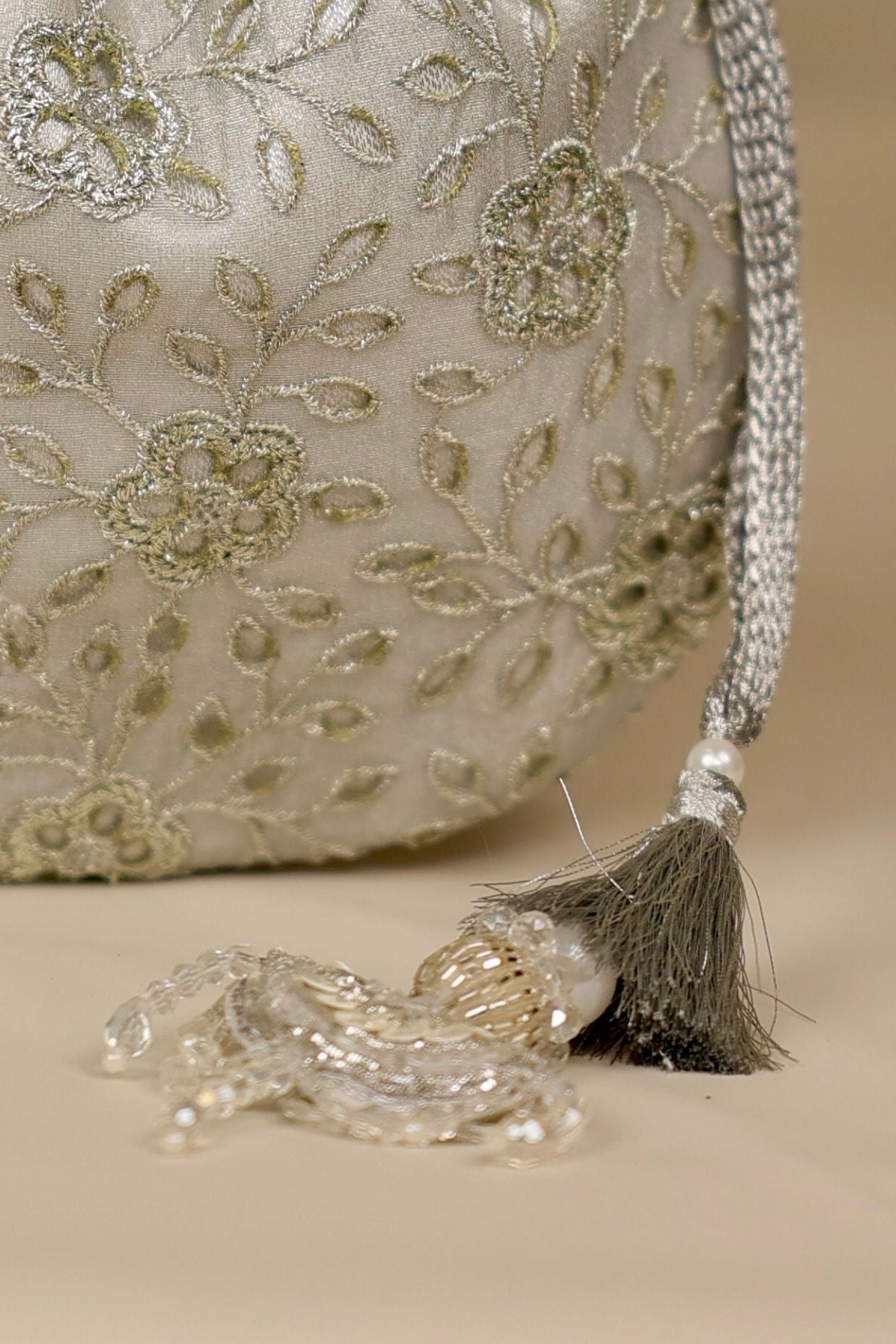 Tarang cutwork potli - Silver