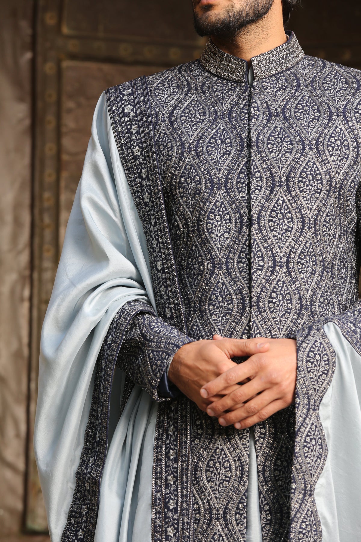 NAVY BLUE MATKA TUSSAR ALL OVER EMBROIDERED ACHKAN WITH ICE BLUE KURTA AND TROUSER