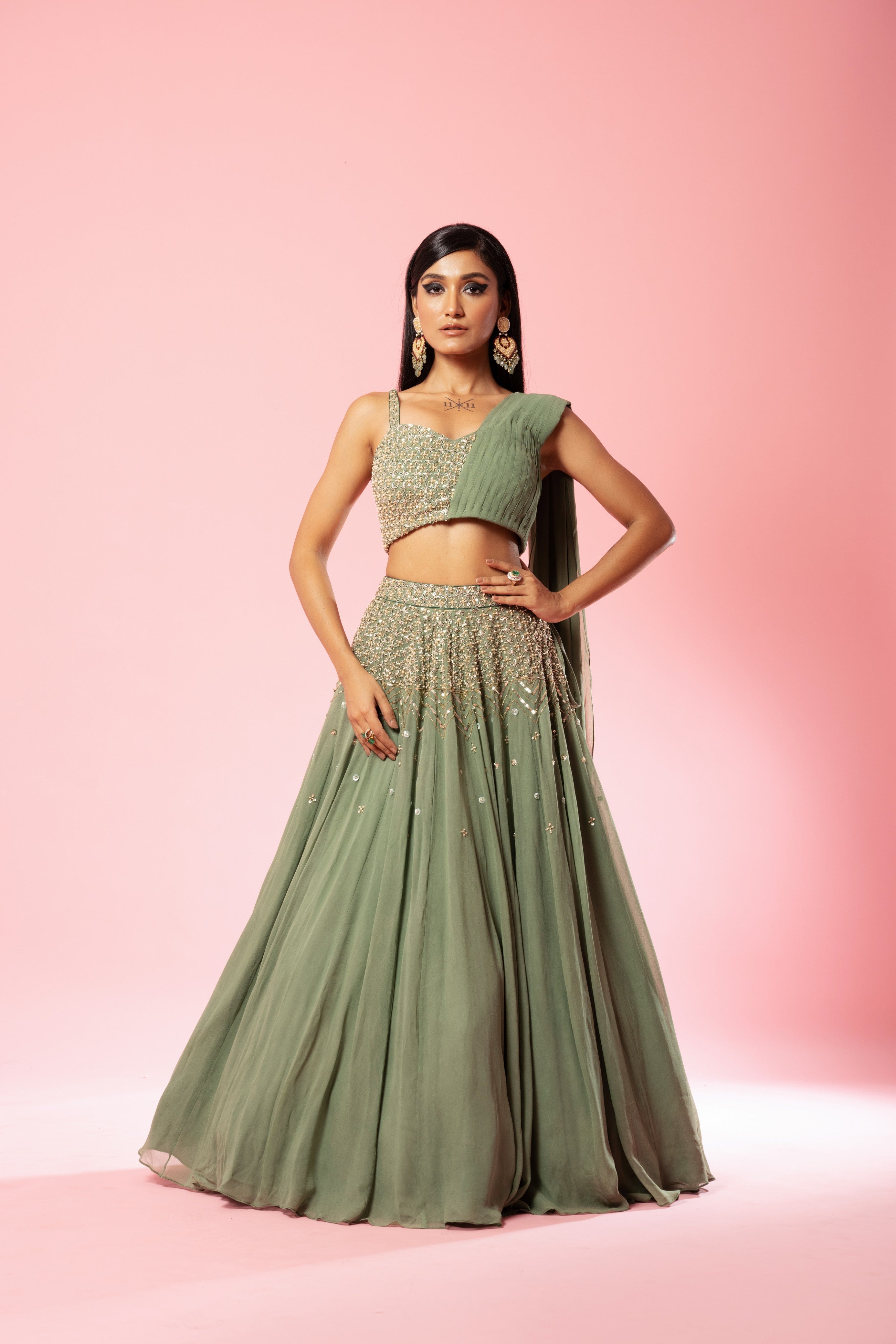 Sage green drape lehenga set