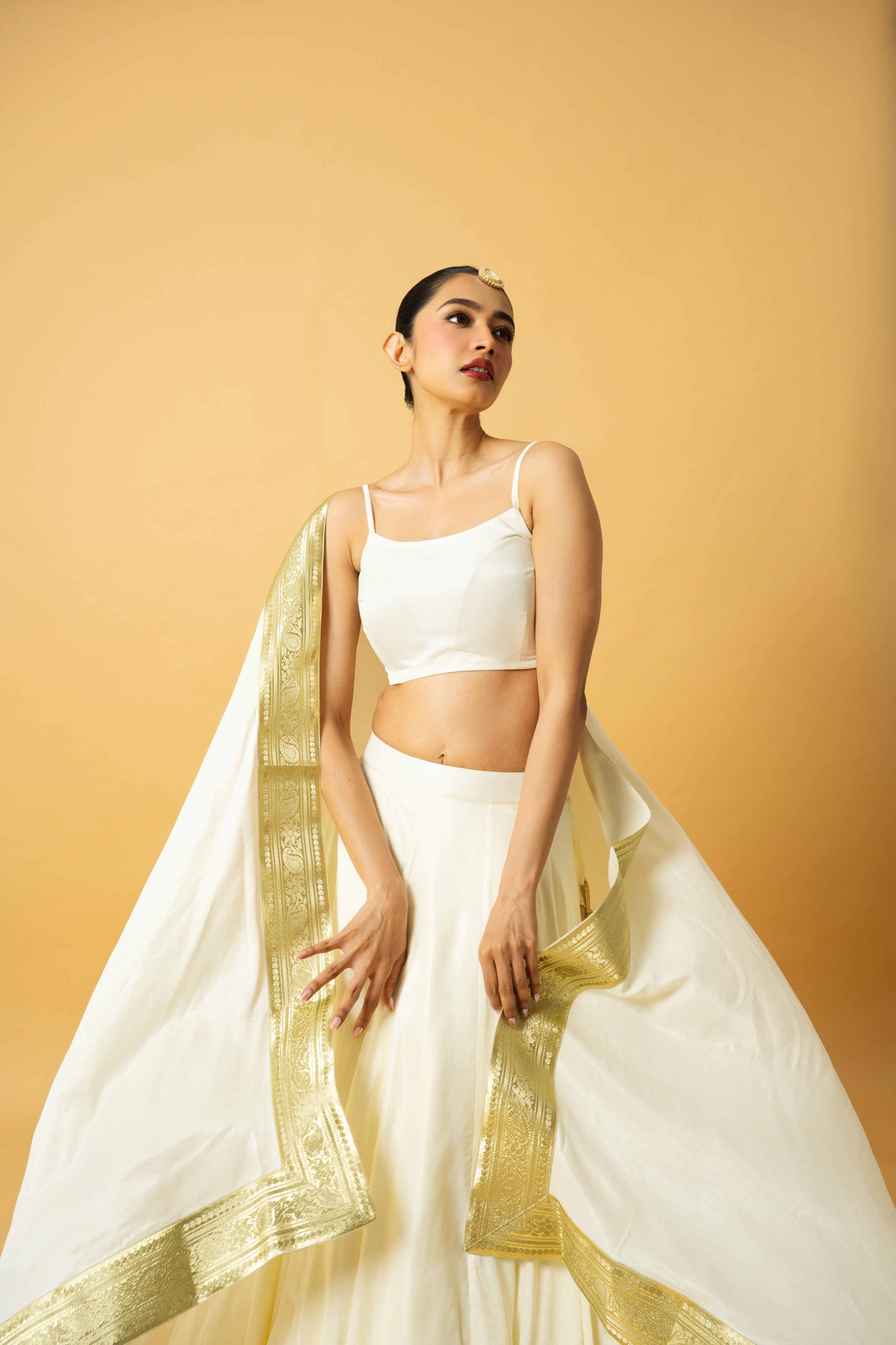 Ivory modal satin lehenga with golden lace in dupatta