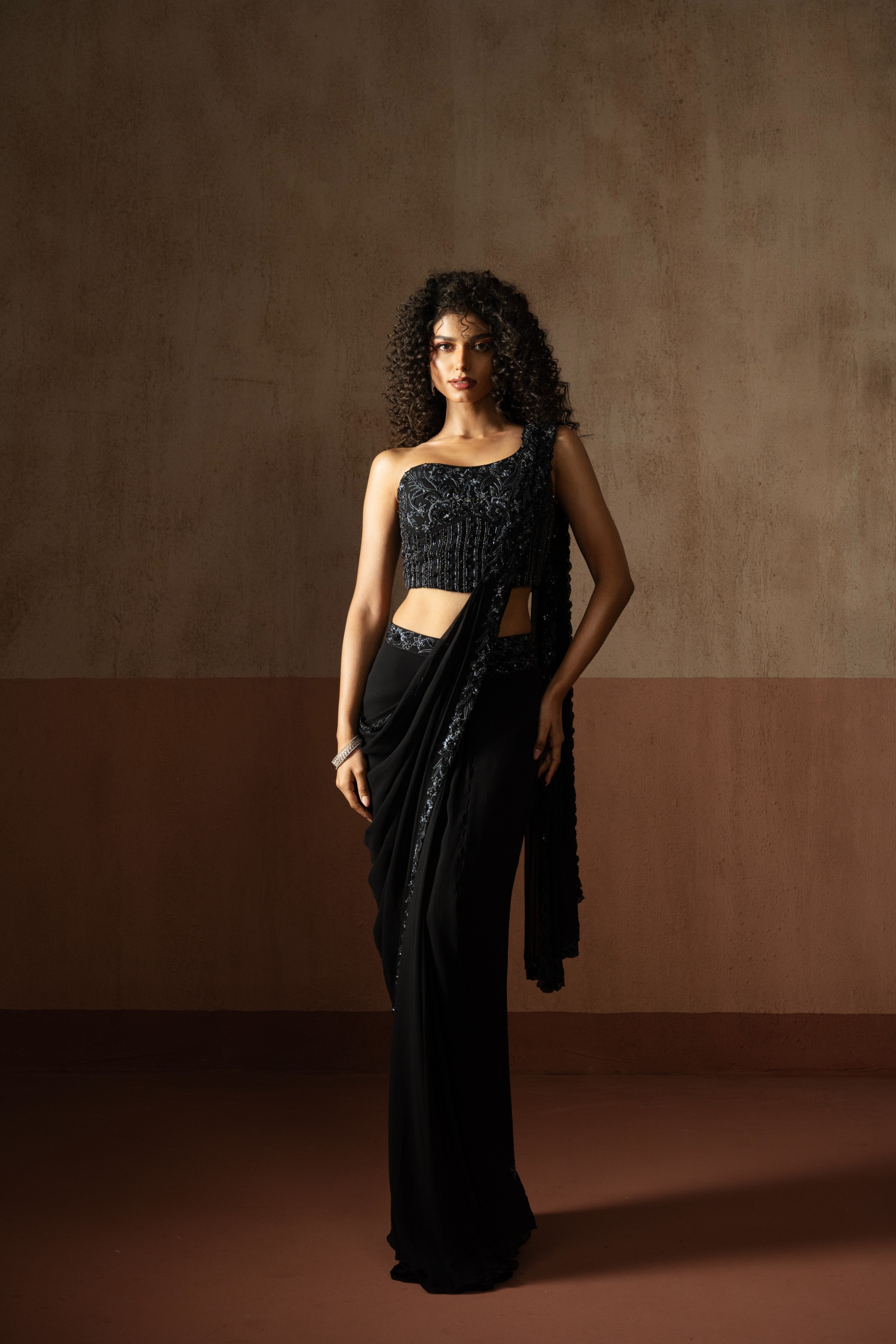 Predraped , black hand embroidered georgette saree