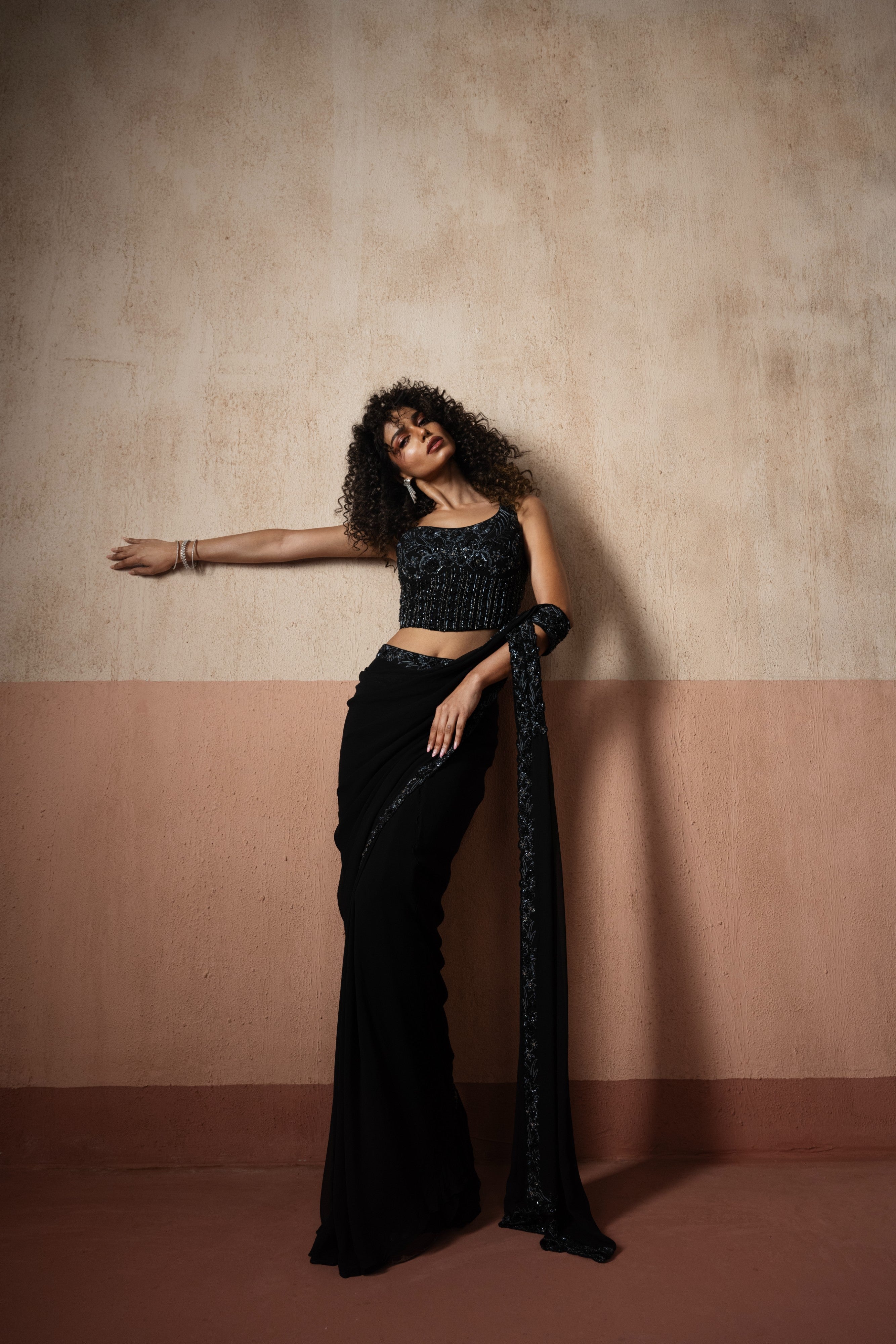 Predraped , black hand embroidered georgette saree