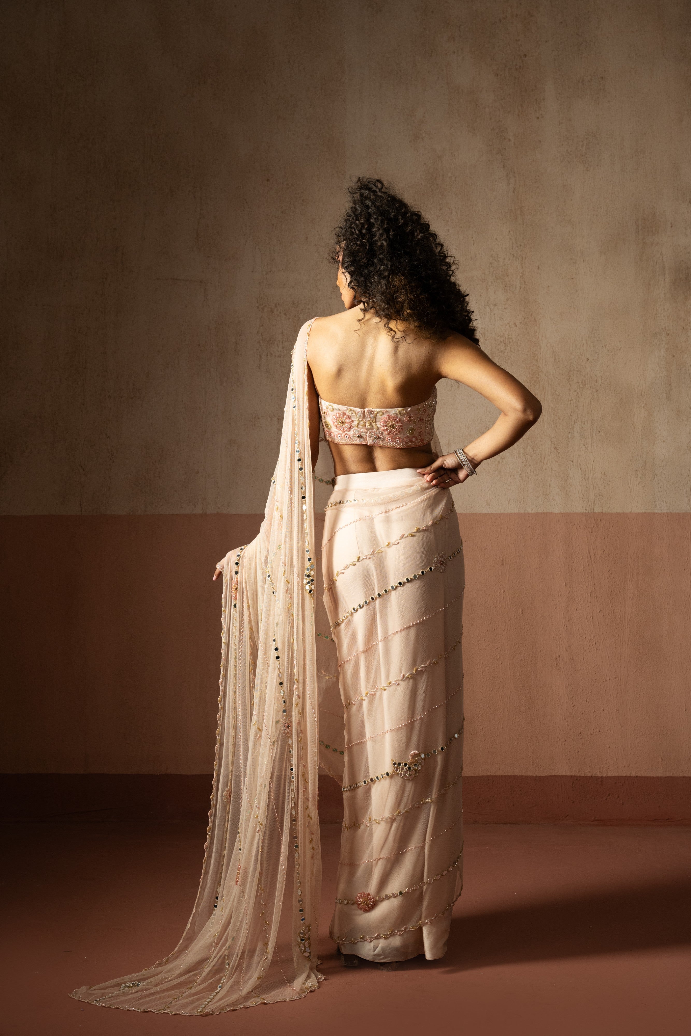 Predraped , baby pink , hand embroidered net & satin saree