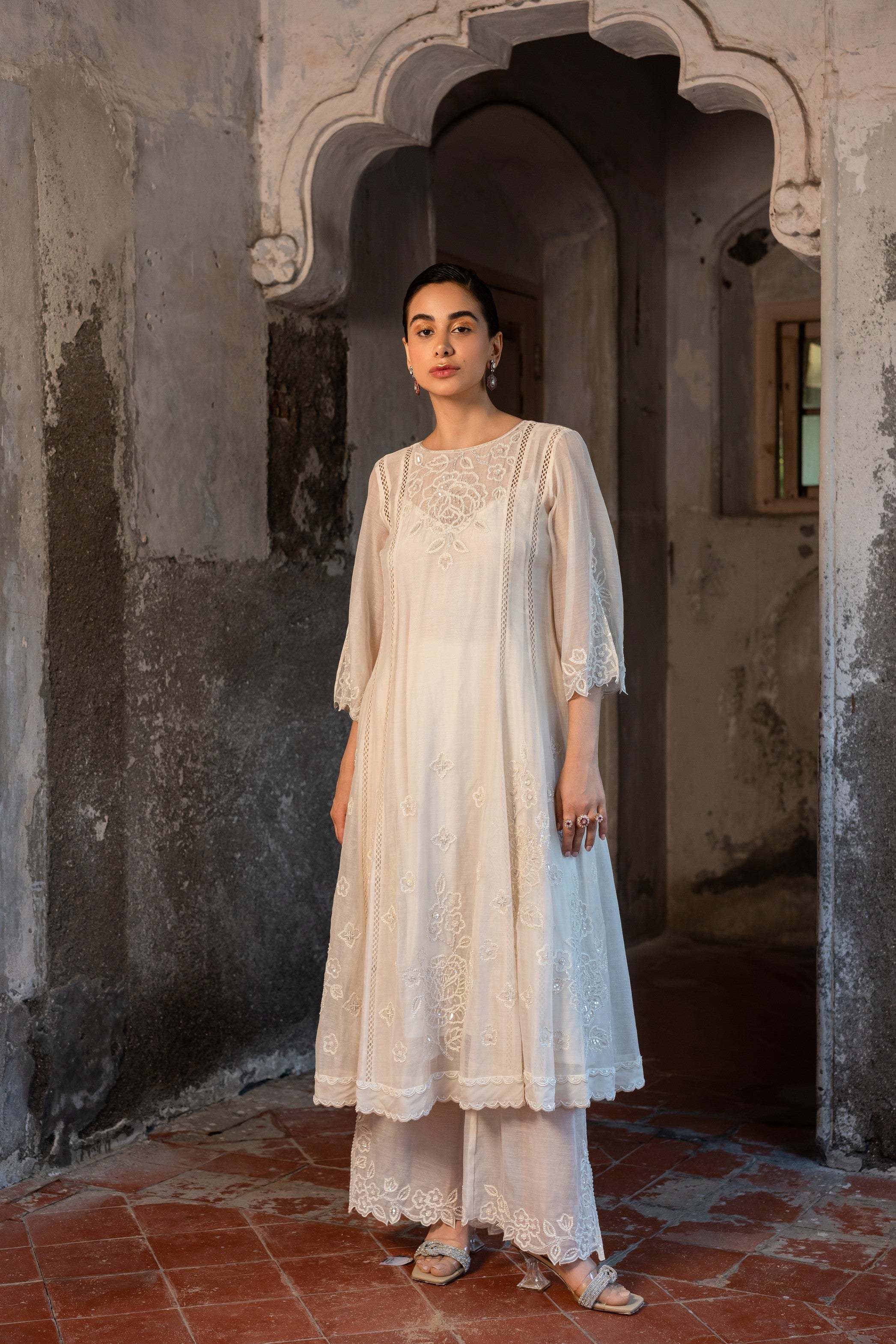 A hand embroidered kurta set with pants