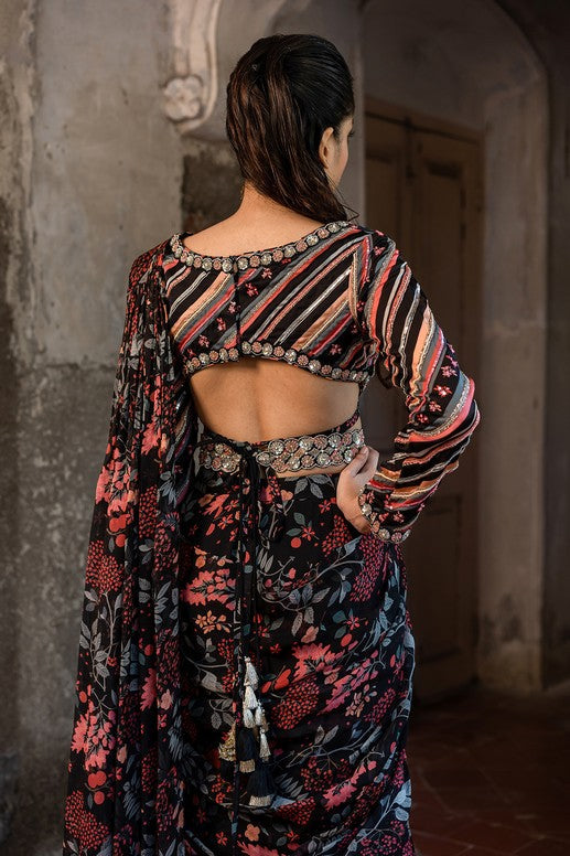 A pre-draped layer saree with hand embroidered blouse and belt