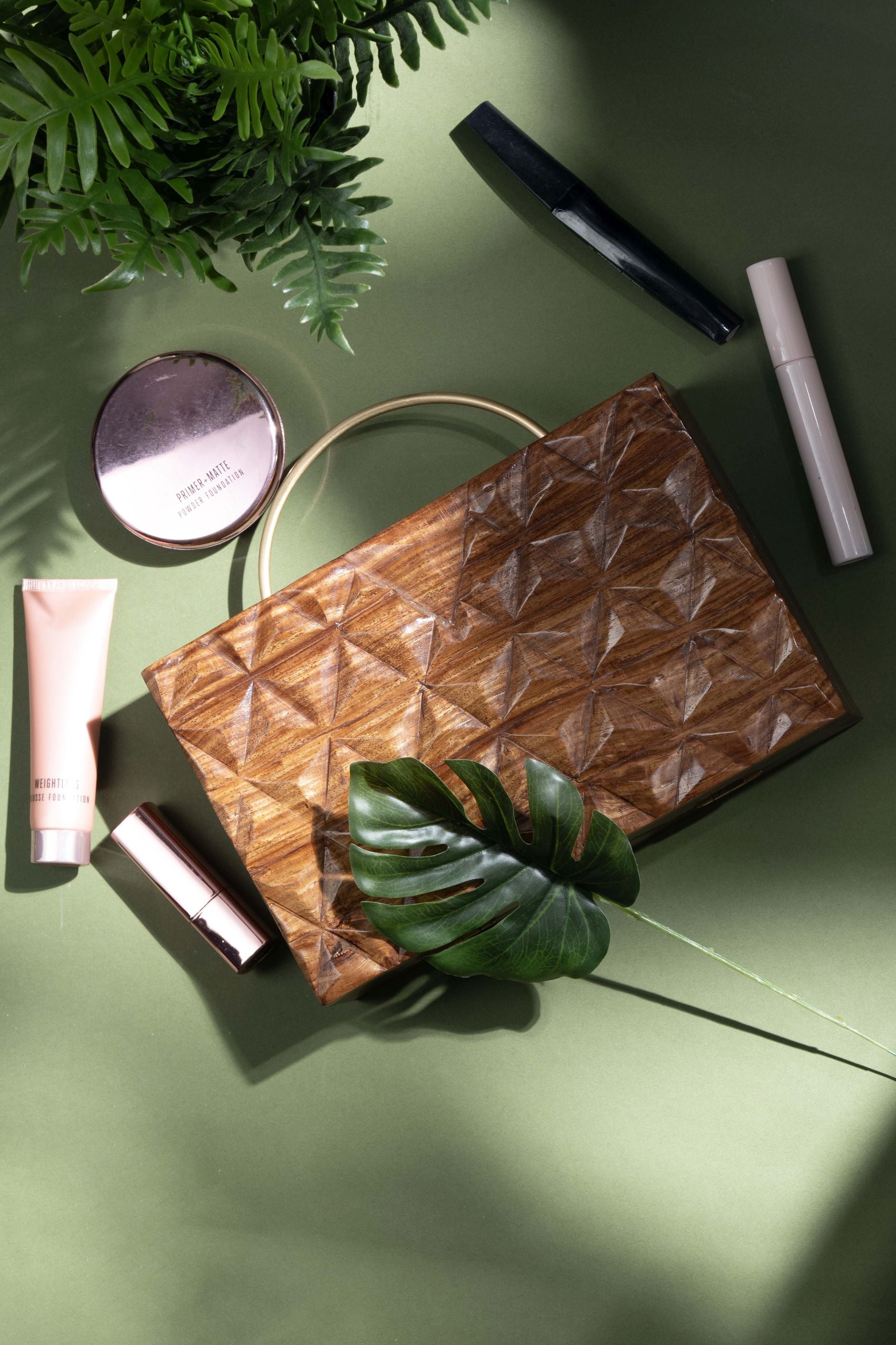 HAND CARVED TRIANGULAR PATTERN BAG WITH HALF ROUND HANDLE