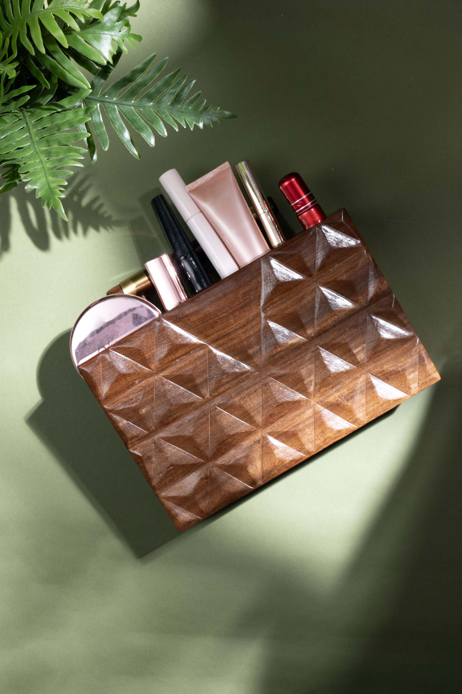 HAND CARVED TRIANGULAR PATTERN BAG WITH DOWEL HANDLE