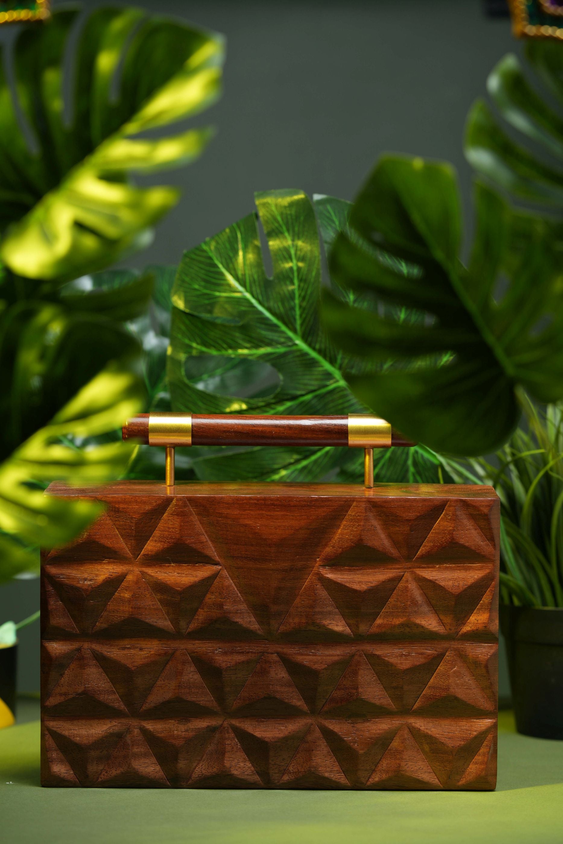 HAND CARVED TRIANGULAR PATTERN BAG WITH DOWEL HANDLE