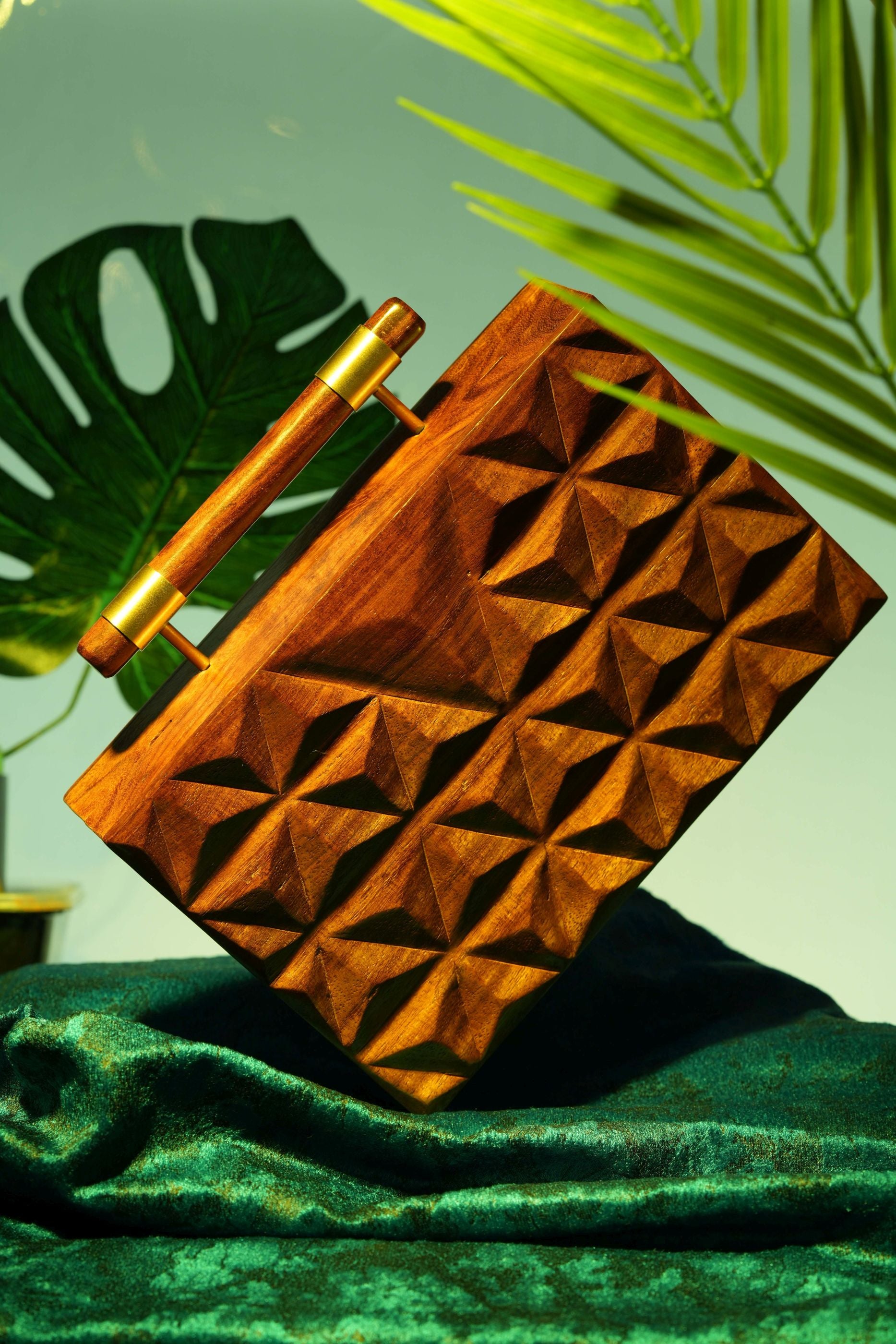HAND CARVED TRIANGULAR PATTERN BAG WITH DOWEL HANDLE