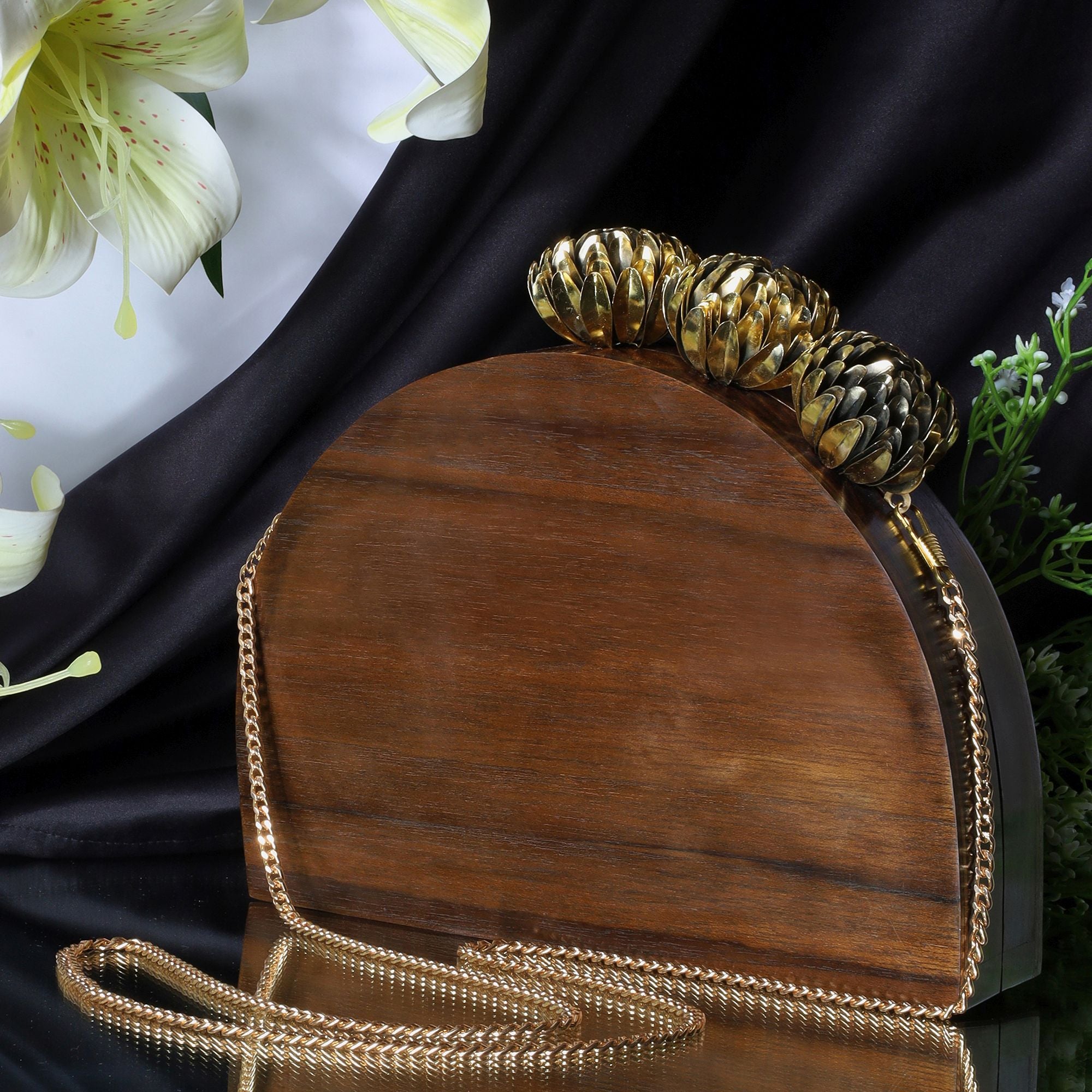 SEMI CIRCLE BAG WITH ORNATE BRASS FLOWERS IN SOLID SHEESHAM WOOD