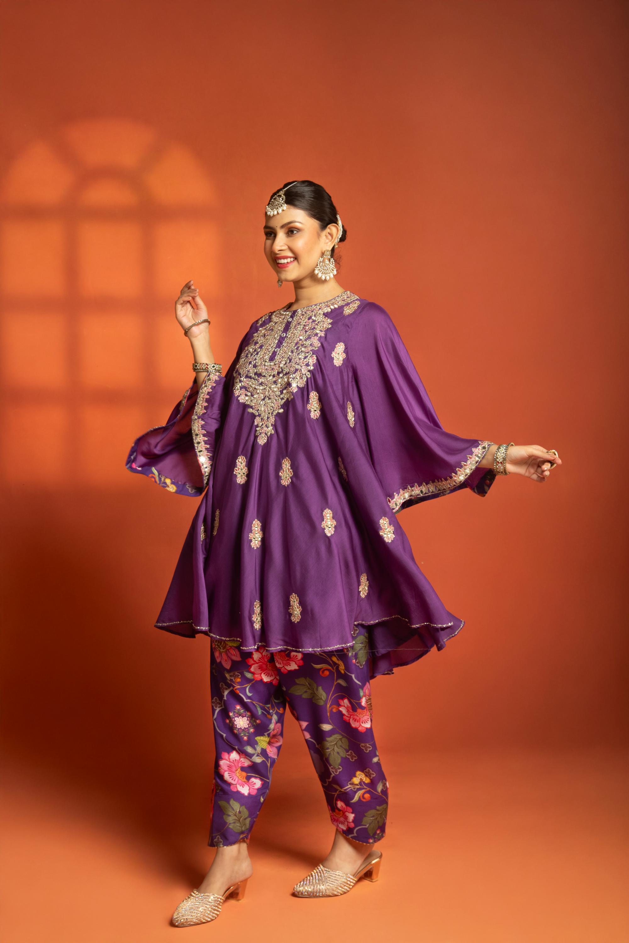 Purple Short Semi- Anarkali with a heavily Embroidered Neckline, Paired with Floral Printed Salwar Pants & Dupatta