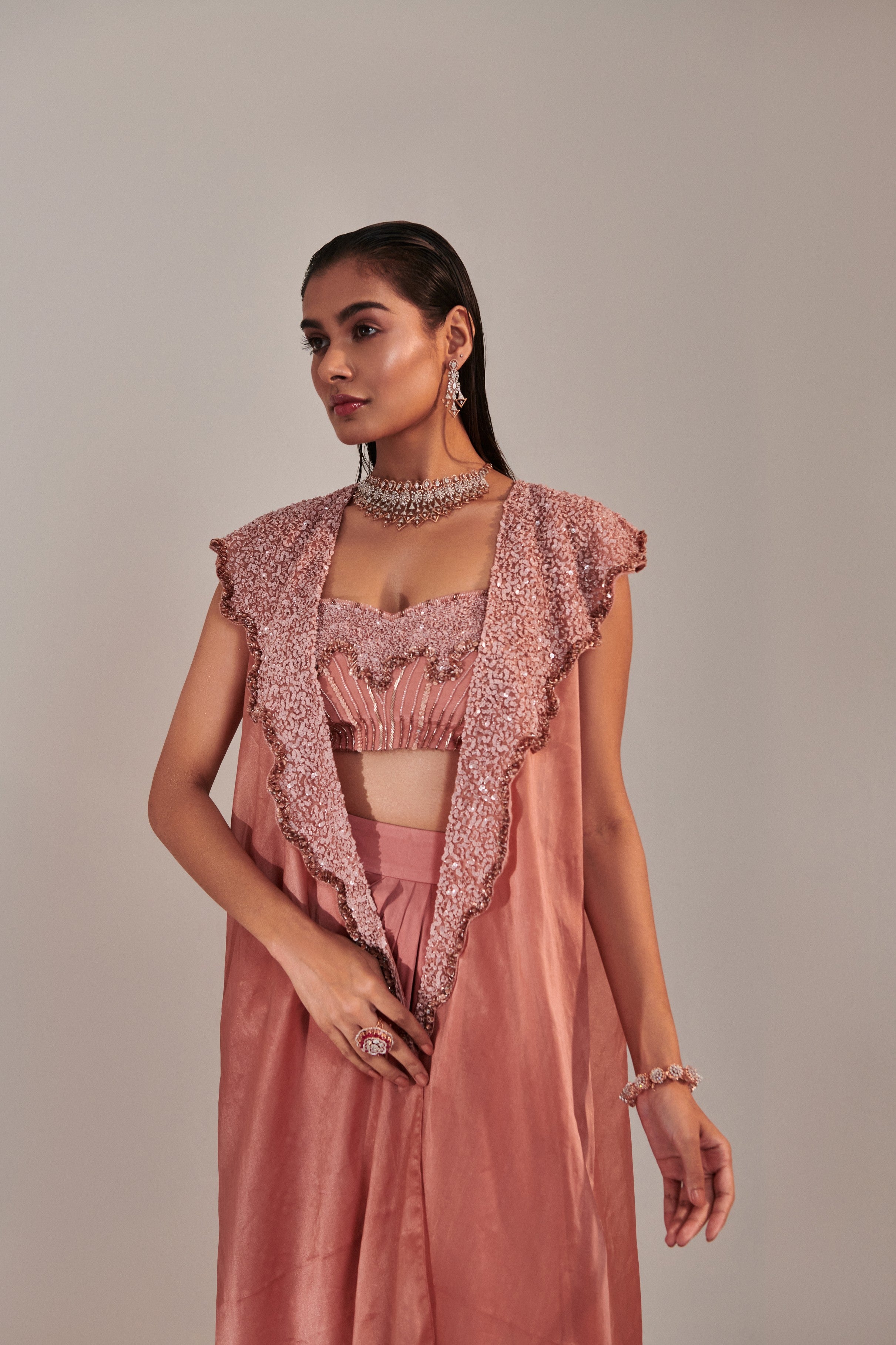 Salmon pink shawl collar cutwork cape and water effect embroidred blouse