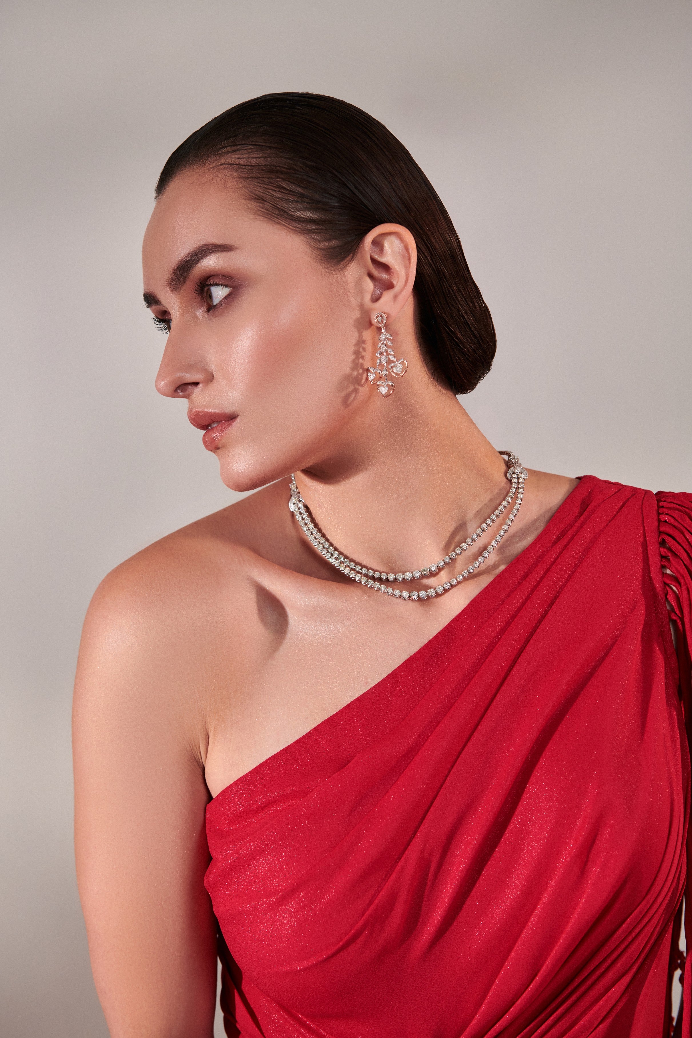 Draped scarlet gown with 3d hand embroidered flower detail on front