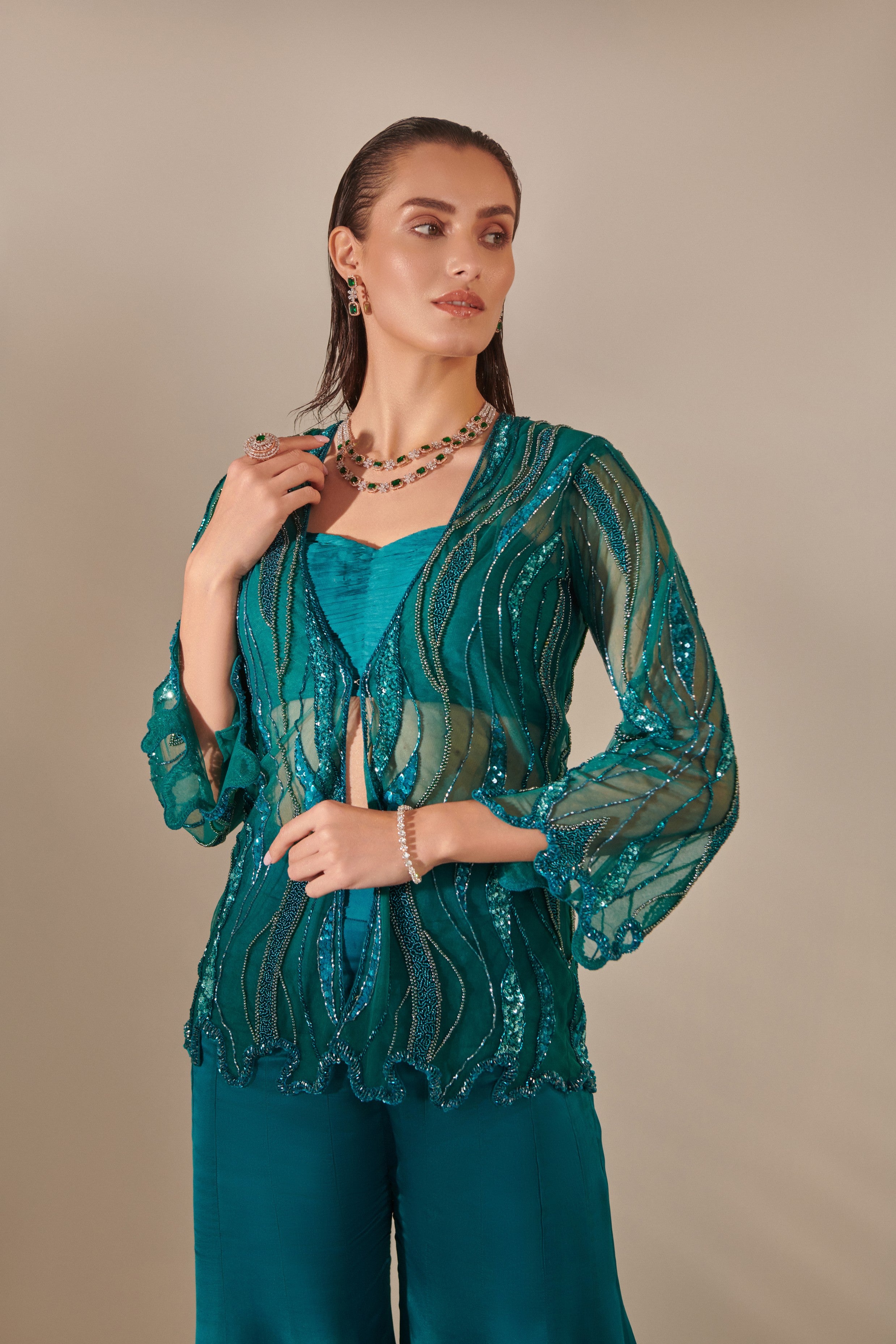 Teal cutwork tulle jacket , kalidar sharara, ruched bustier