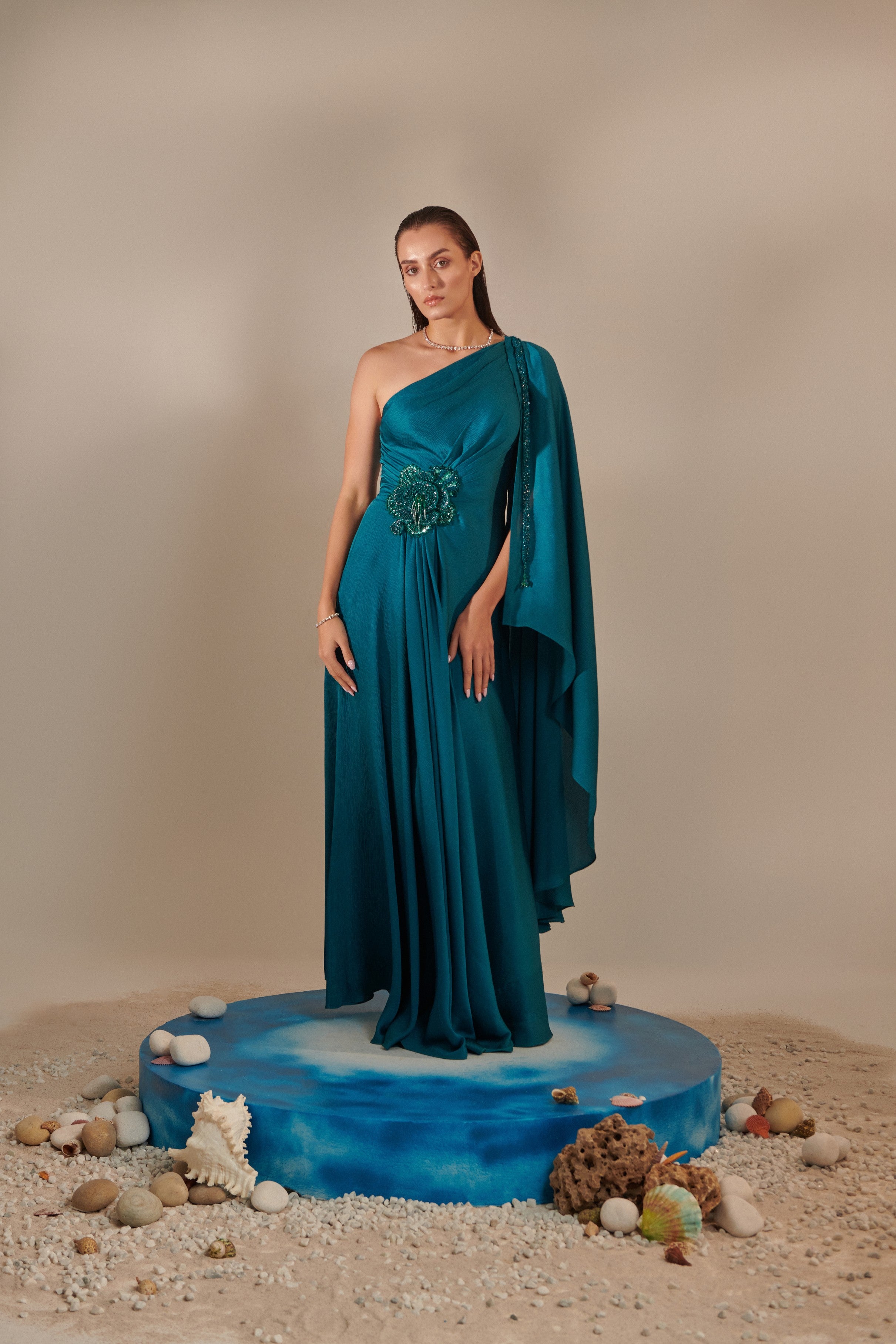 Teal one shoulder drape gown
